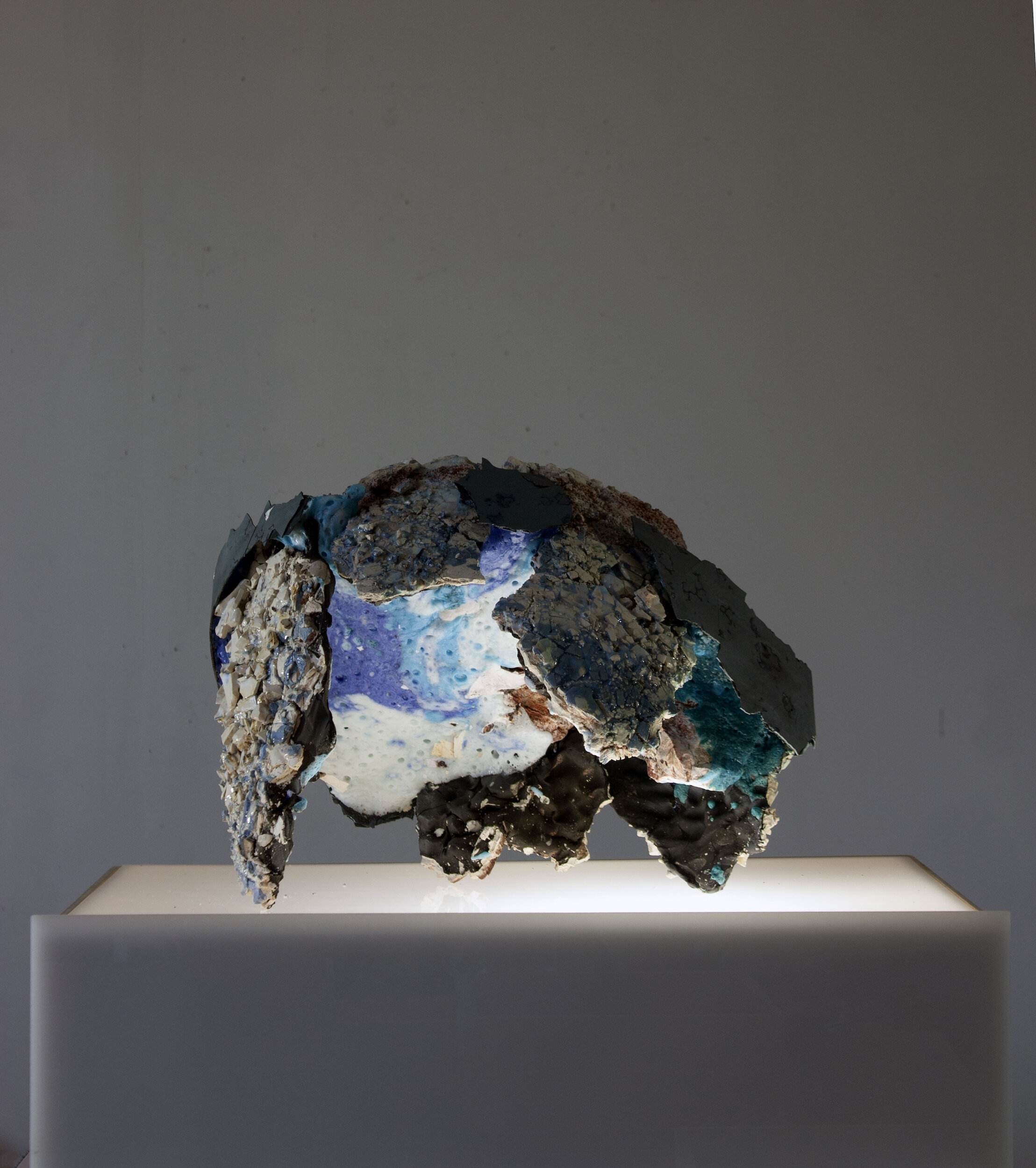 Sarah Knight  / "Underside of the Landscape" / 2021 / Ceramic, melted stone, steel, ceramic glaze / 18" x 14" x 11"