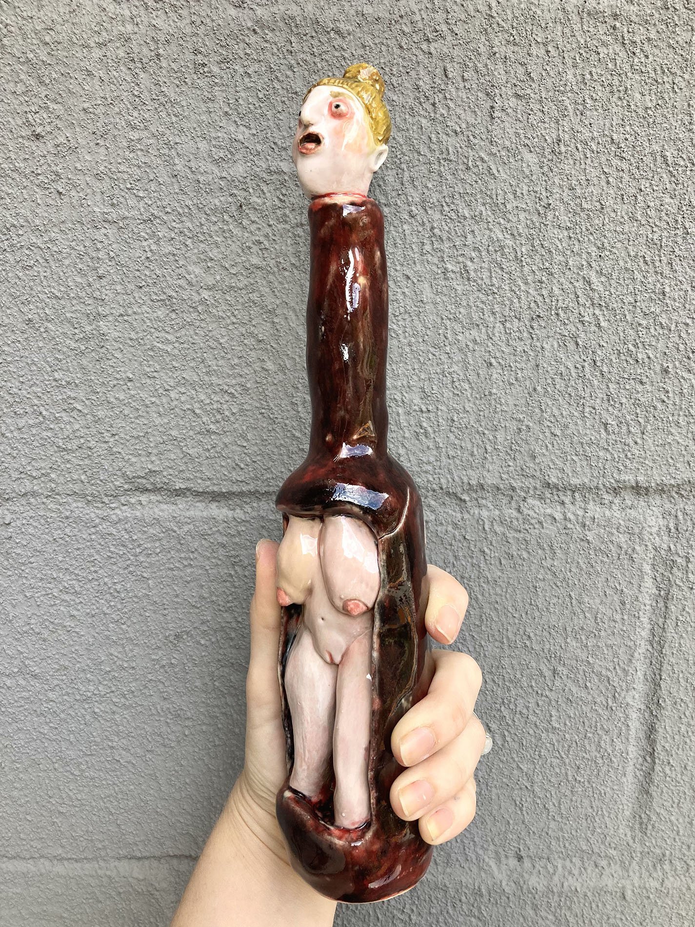 06_JACOBRHODES_BOTTLE_LADY_CERAMIC_12X3_2023_LAURENCOHEN.jpg