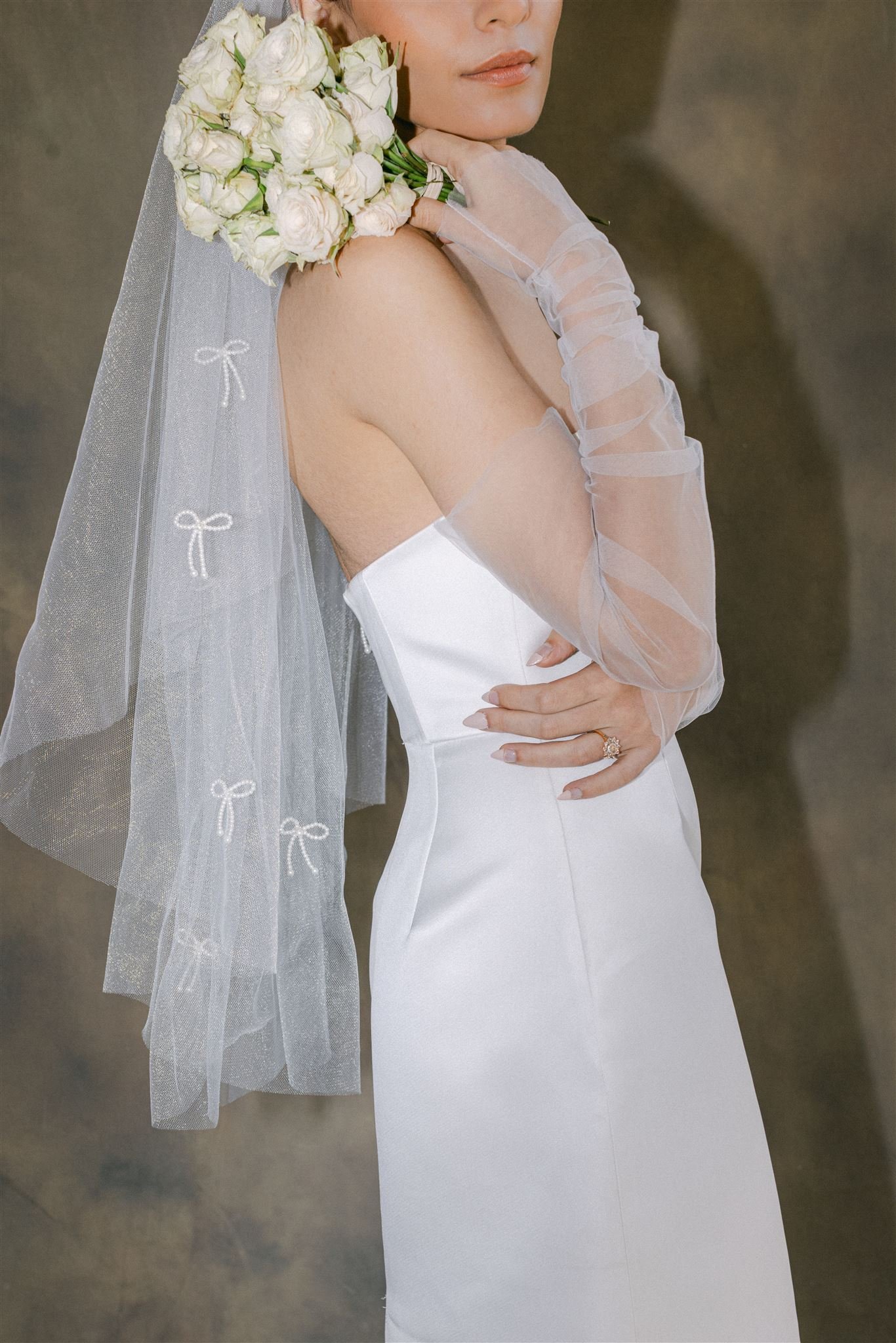 CELESTE-pearl-bow-agatha-veil.jpg
