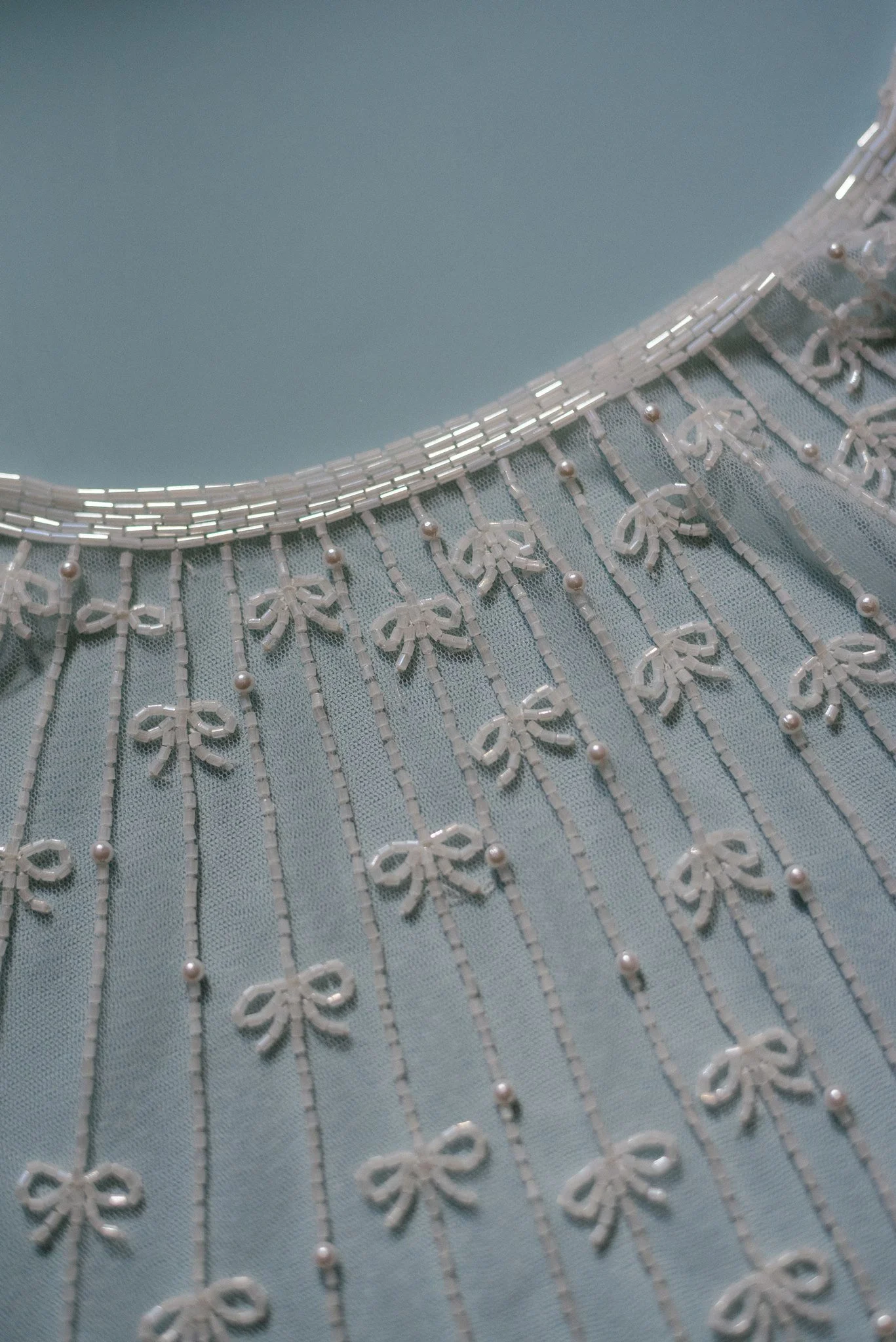 dolly-cape-bow-bead-detail.jpg.jpg