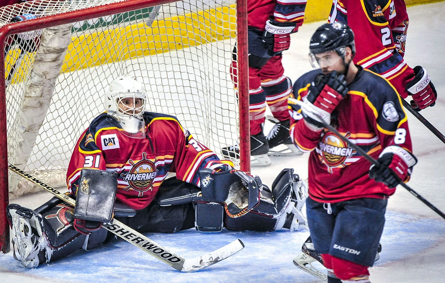 Rivermen goaltender Kyle Rank (31) and teammate Steve Morra (88) react to an Ice Flyers goal during the second period of their game at Carver arena in Peoria, Illinois, Saturday night. The Ice Flyers defeated the Rivermen 2-1. 