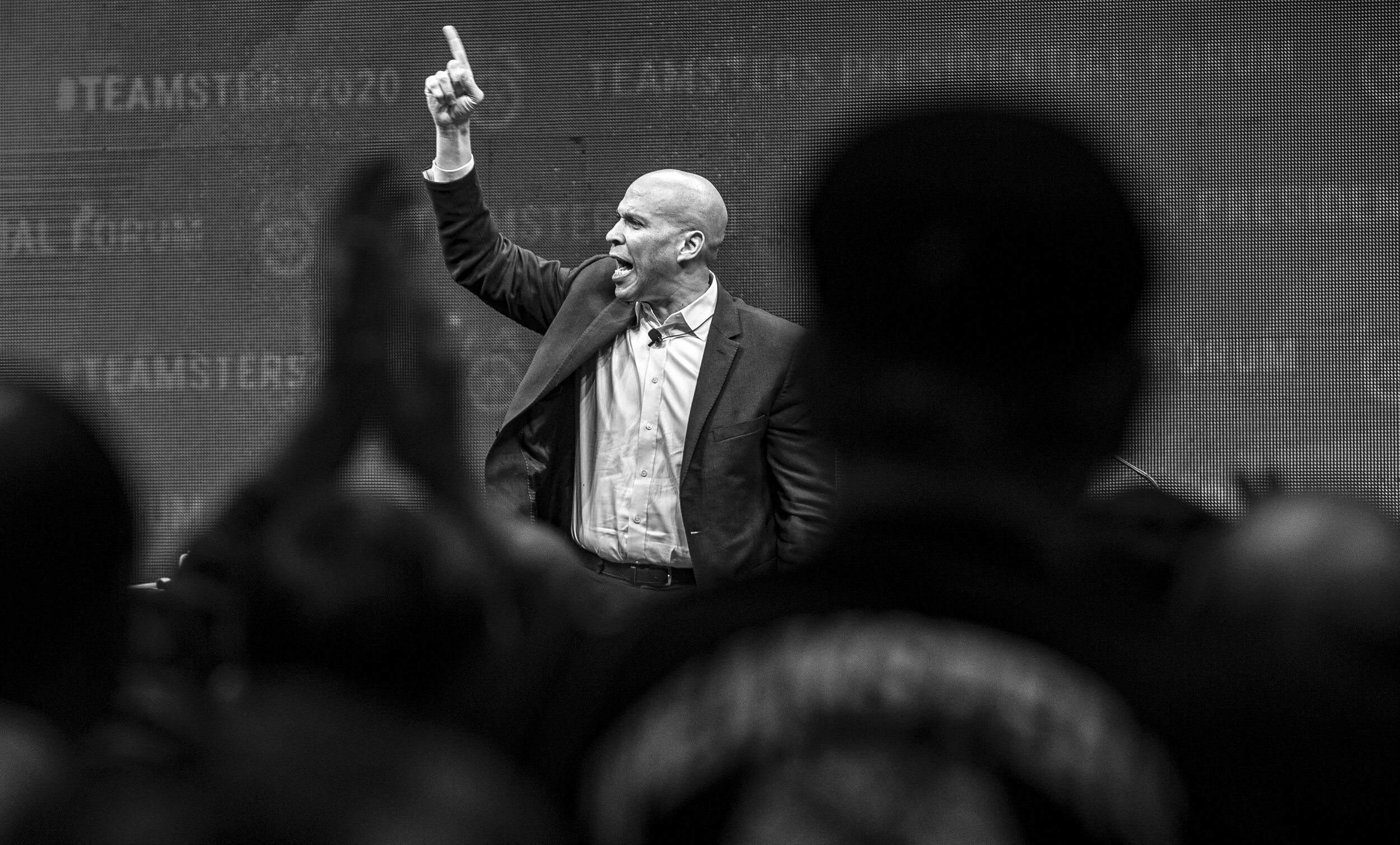  Democratic presidential candidate Sen. Cory Booker (D-N.J.) cheers to the crowd as he exits the stage after speaking during the Teamsters Presidential Candidate Forum at the Veterans Memorial Coliseum in Cedar Rapids, Iowa, Saturday. 