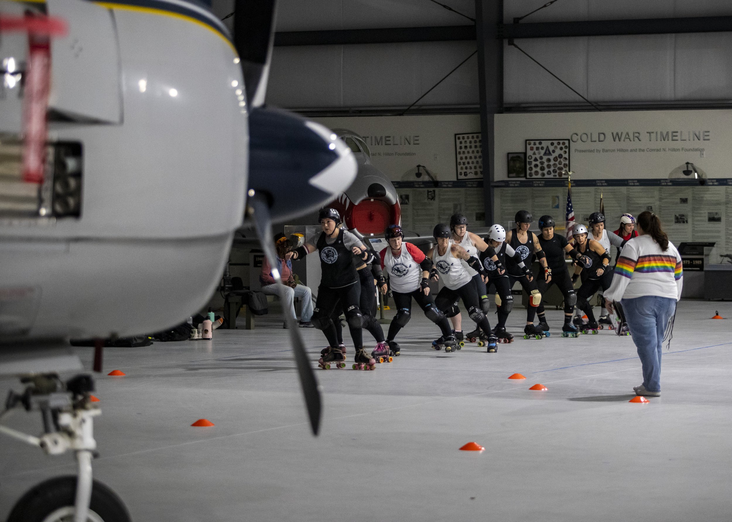  Skaters run through footwork drills lead by assistant coach Rebecca Ruffing during their first practice at the Palm Springs Air Museum in Palm Springs, Calif., Monday.  