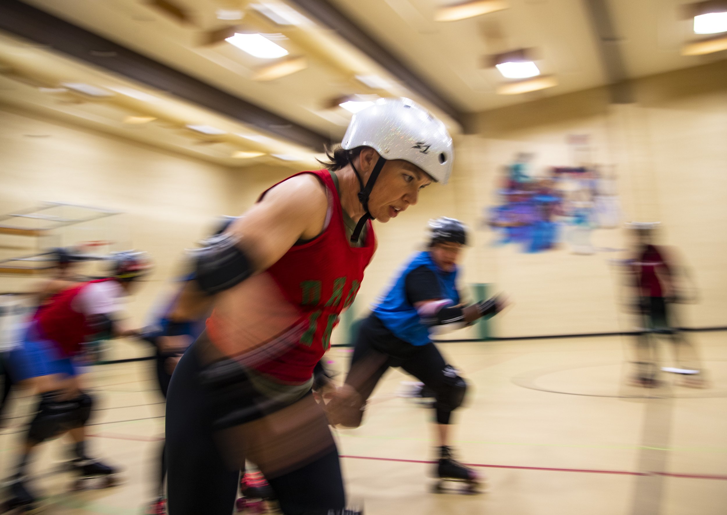  Ginny Borderick skates through blockers while on a jam at the James O. Jessie Desert Highland Unity Center in Palm Springs, Calif., Wednesday.  