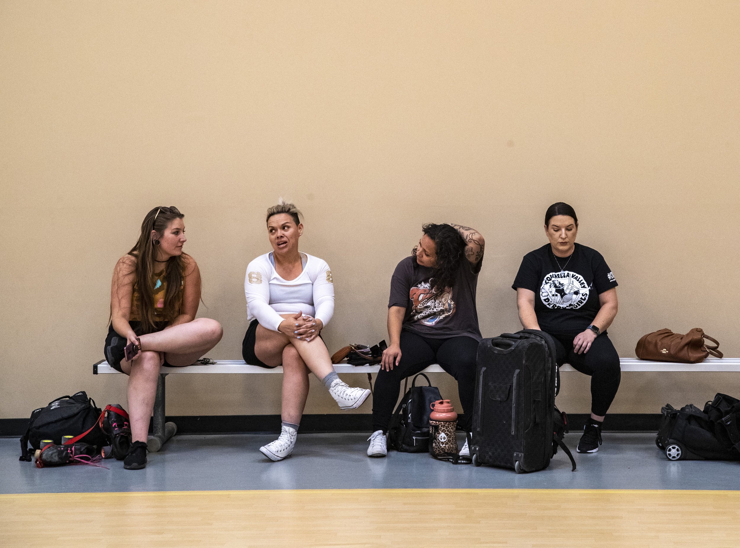  Teammates sit on a bench together after a failed skating test at the Desert Sports Center in Palm Desert, Calif., Saturday. The team was hoping the facility may work out to host a home game but the surface turned out to be much too soft for their sk