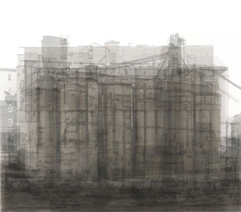  This is every U.S. grain elevator in Bernd and Hilla Becher's photography book of grain elevators that have a more horizontal form than vertical, all over-layed on top of each other. 