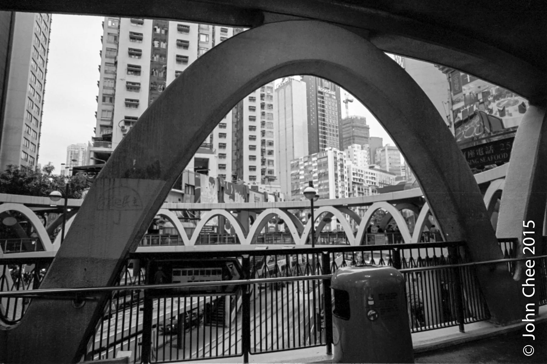 Trace of the Umbrella Movement on one of the poles of this elevated walkway (Causeway Bay, Hong Kong)