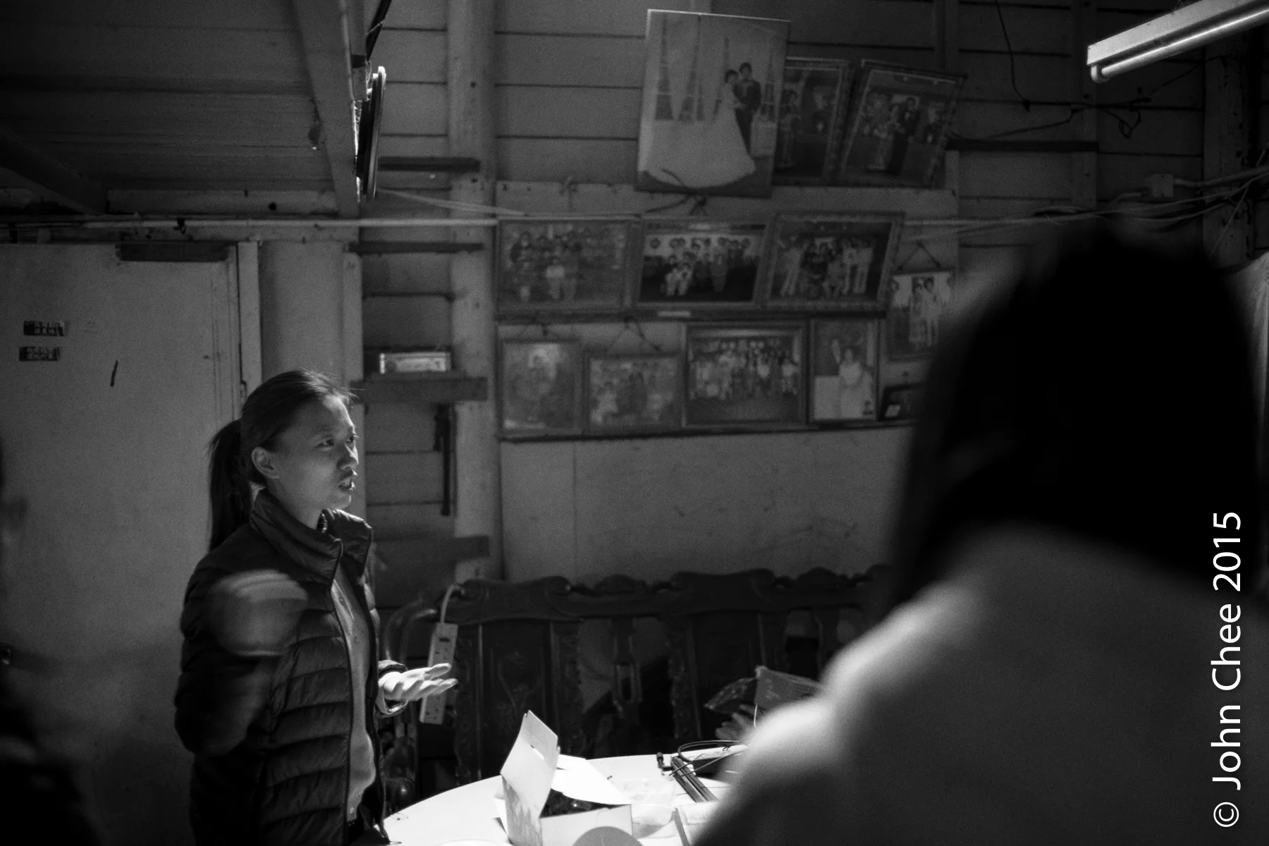 Ms. Kaikai Cho, Mapopo Community Farm, explaining to visitors why the government should not convert farmland in Hong Kong into shopping malls and apartment buildings. (Fanling, Hong Kong)