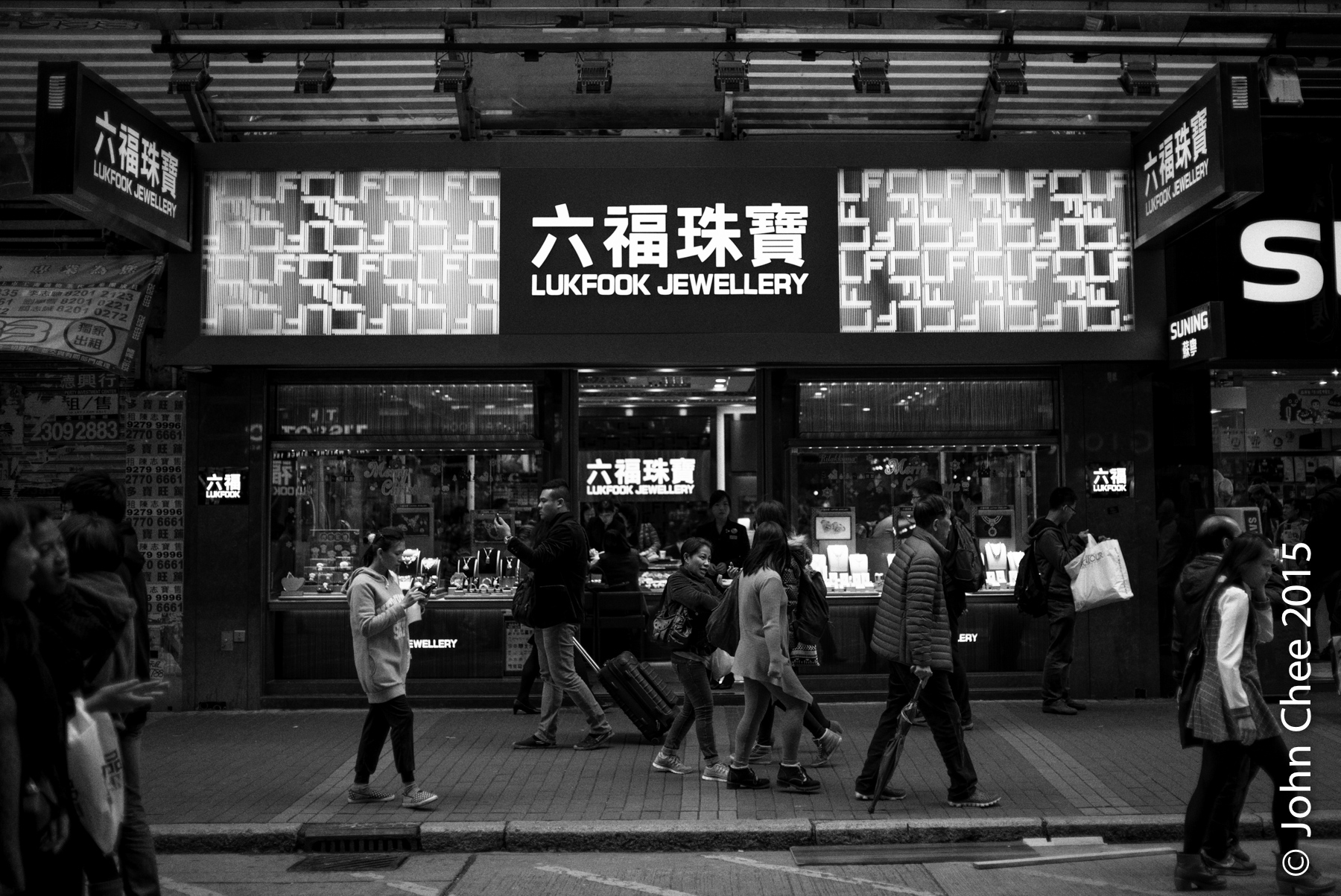There are mostly three kinds of retail shops in Mong Kok, jewelry shops, electronics and drug stores that can survive the high rent. They are tailored for tourists and smugglers from China. Most old stores are long gone as they could not deal with the heightened rent. These stores and visitors affect the community and destroy neighborhoods. Therefore, stores like this are not welcomed by the local communities. (Hong Kong)