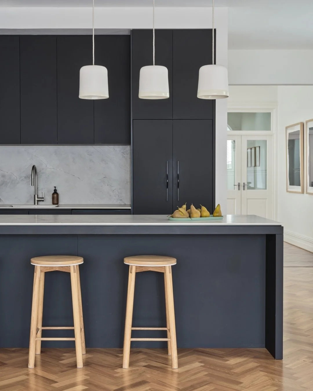 Before and after! Swipe to see the transformation at the Randwick project.

This one is hard to visualise because the original layout was such a rabbit warren of walls and doors. The original kitchen had no connection to the garden and only one small