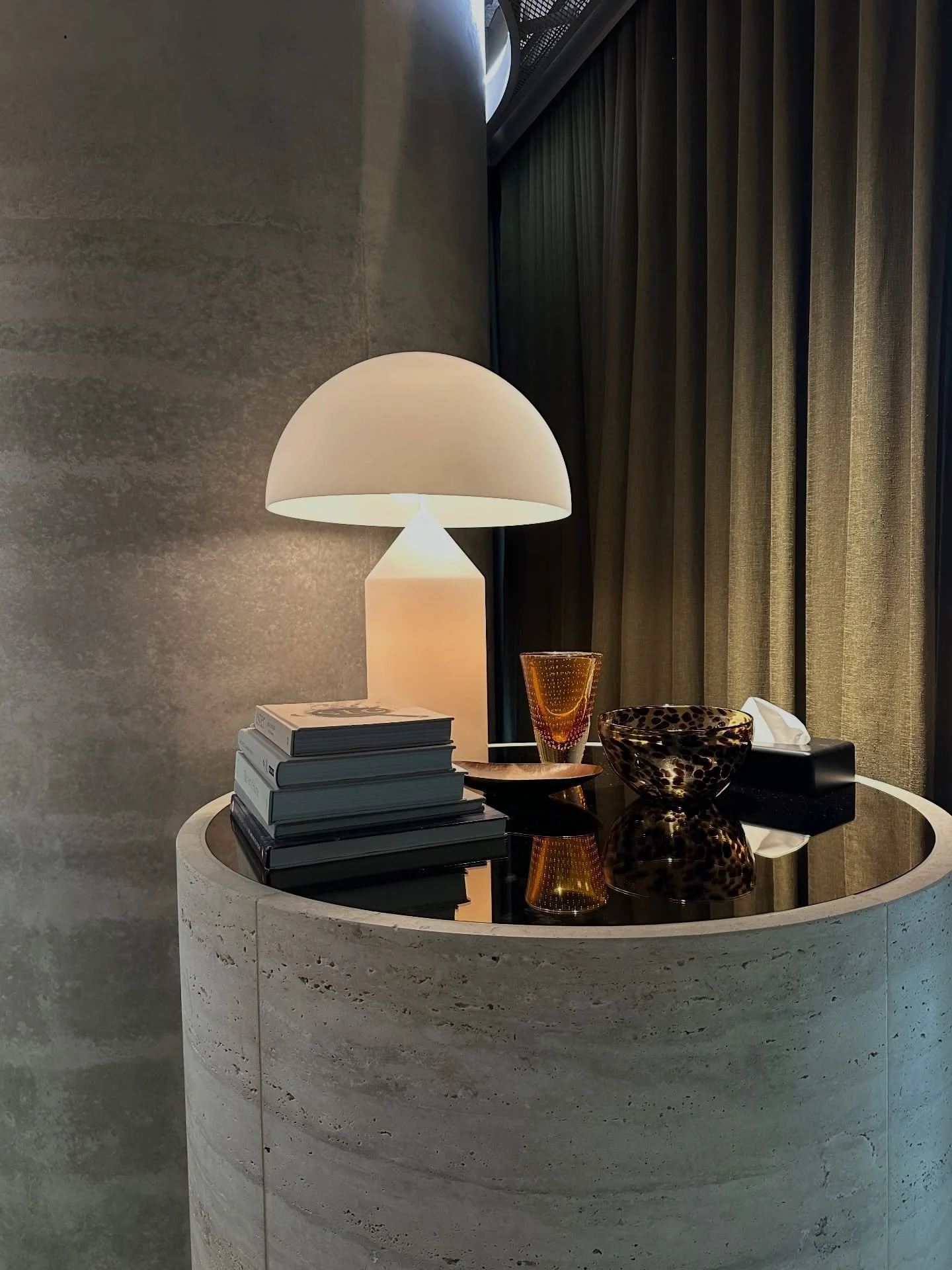 Reflective surfaces and dramatic lighting on point 👌

These can completely shift a space. With considered light, concrete can feel soft and velvety. It&rsquo;s the layering of shadow, sheen and texture that creates depth, and that subtle sense of ri