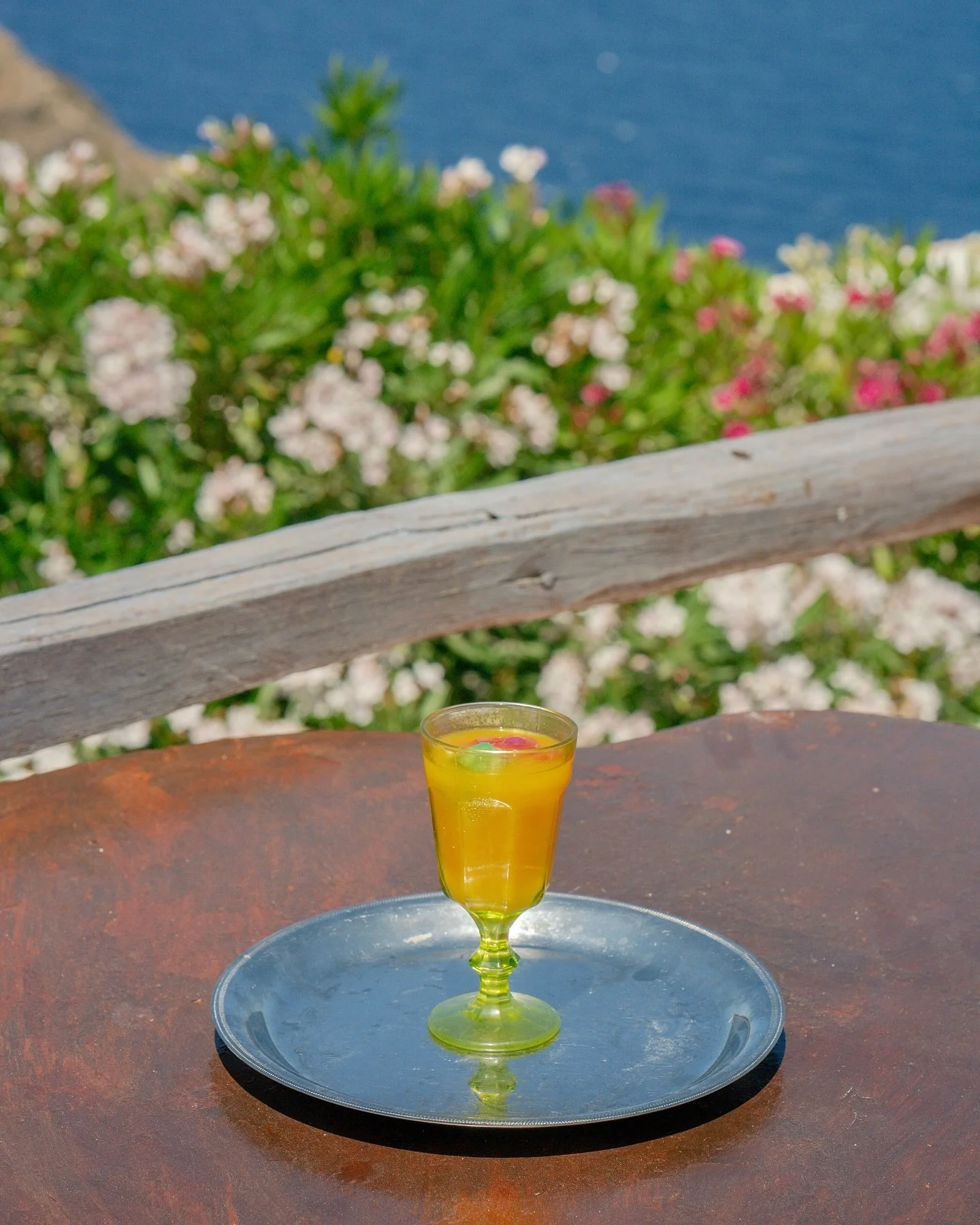 A glass of orange juice greets me on the island of S&iacute;kinos. Home to just 250 residents, this small island was once known as the &ldquo;Island of Wine.&rdquo;
Its hillsides are carved with thousands of agricultural terraces, most abandoned sinc