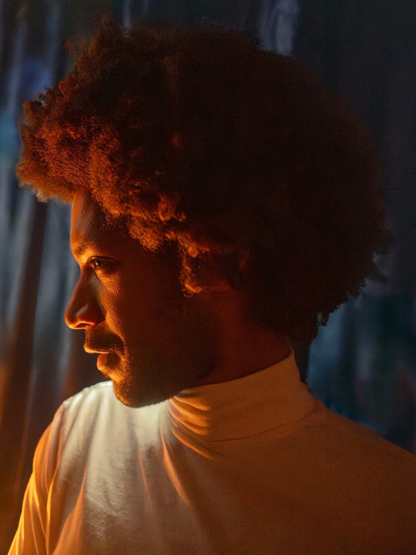 From a young age, Mikhail has suffered from sleep paralysis. They would wake up while dreaming without the ability to move and see specks of orange light all around them, creatures, and demons. To mitigate these frightening and troubling experiences 