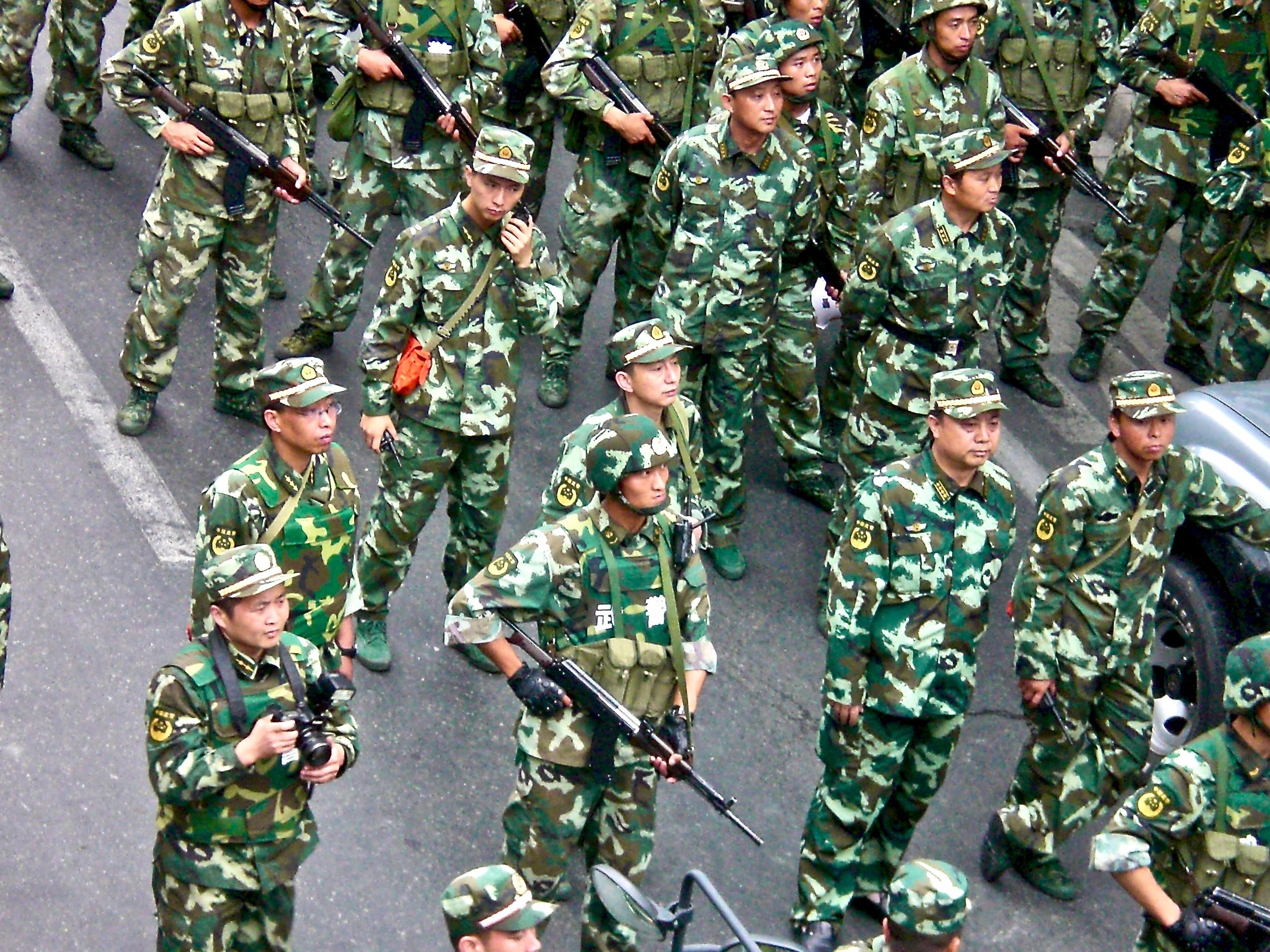 Chinese soldiers in the streets of Urumqi, Xinjiang, after deadly ethnic riots in 2009. (C) Remko Tanis