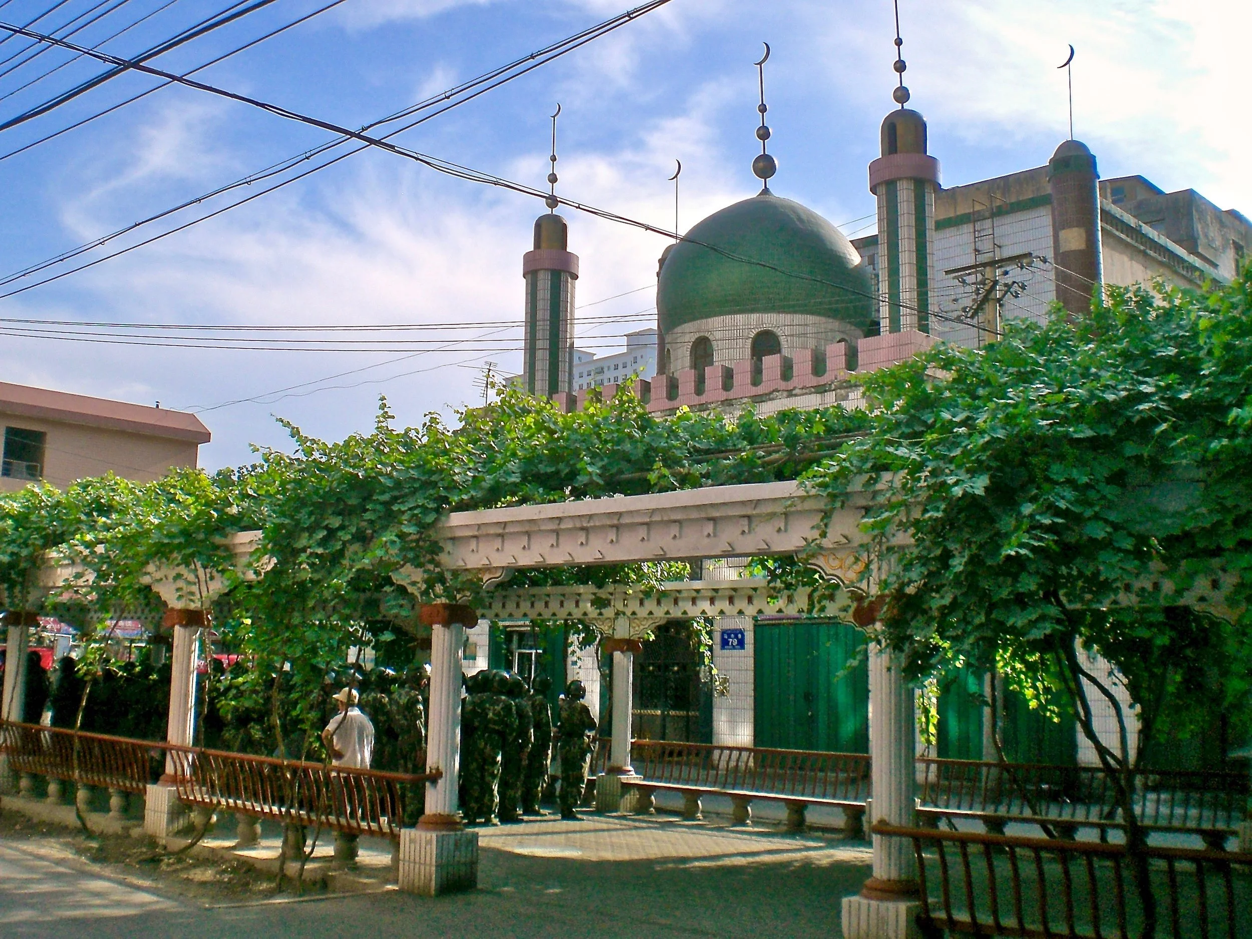 Soldiers on guard at a mosque in Urumqi, Xinjiang, China. (C) Remko Tanis