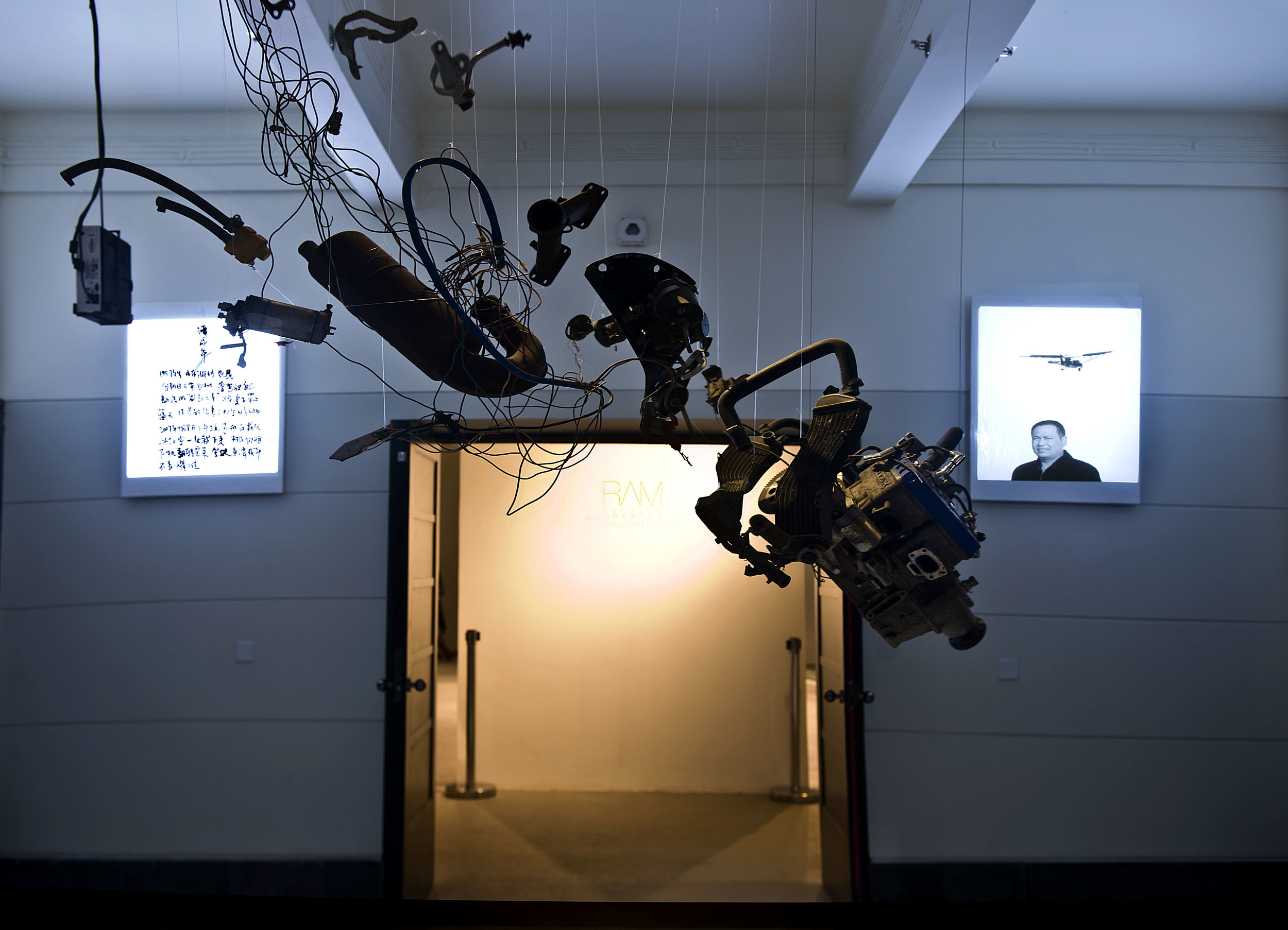 The wreckage of the Cheng Nian 3 hanging in the Rockbund Art Museum in Shanghai, China.