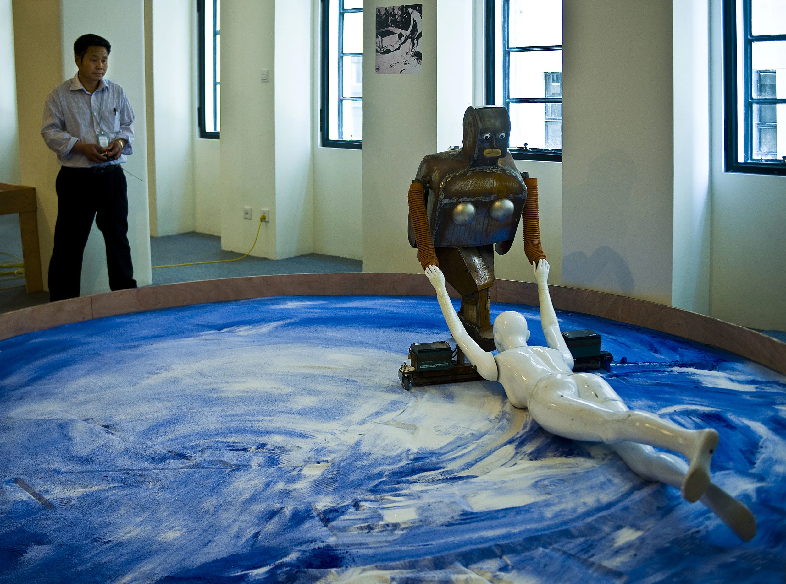 A robot build by farmer-inventor Wu Yulu, imitating French artist Yves Klein at work.