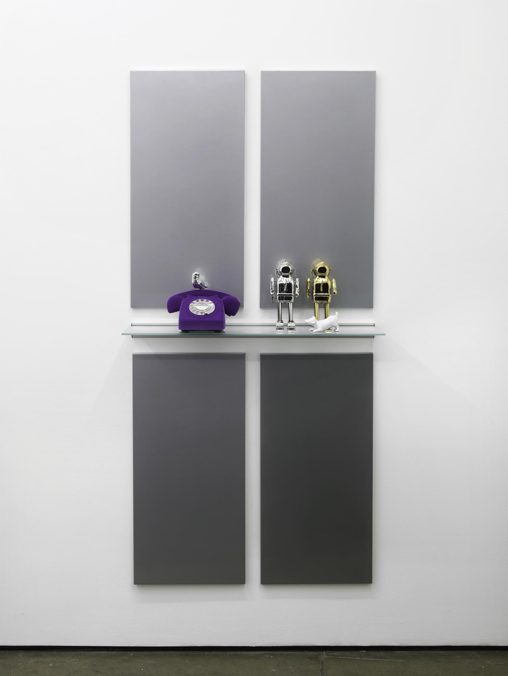     Matthew Darbyshire Untitled Homeware No. 12 2011 Chromed silver and gold toy robots, purple flocked telephone, painted white Beswick dog ornament, &nbsp;glass and steel support:&nbsp;172 x 80 x 16.5 cm 