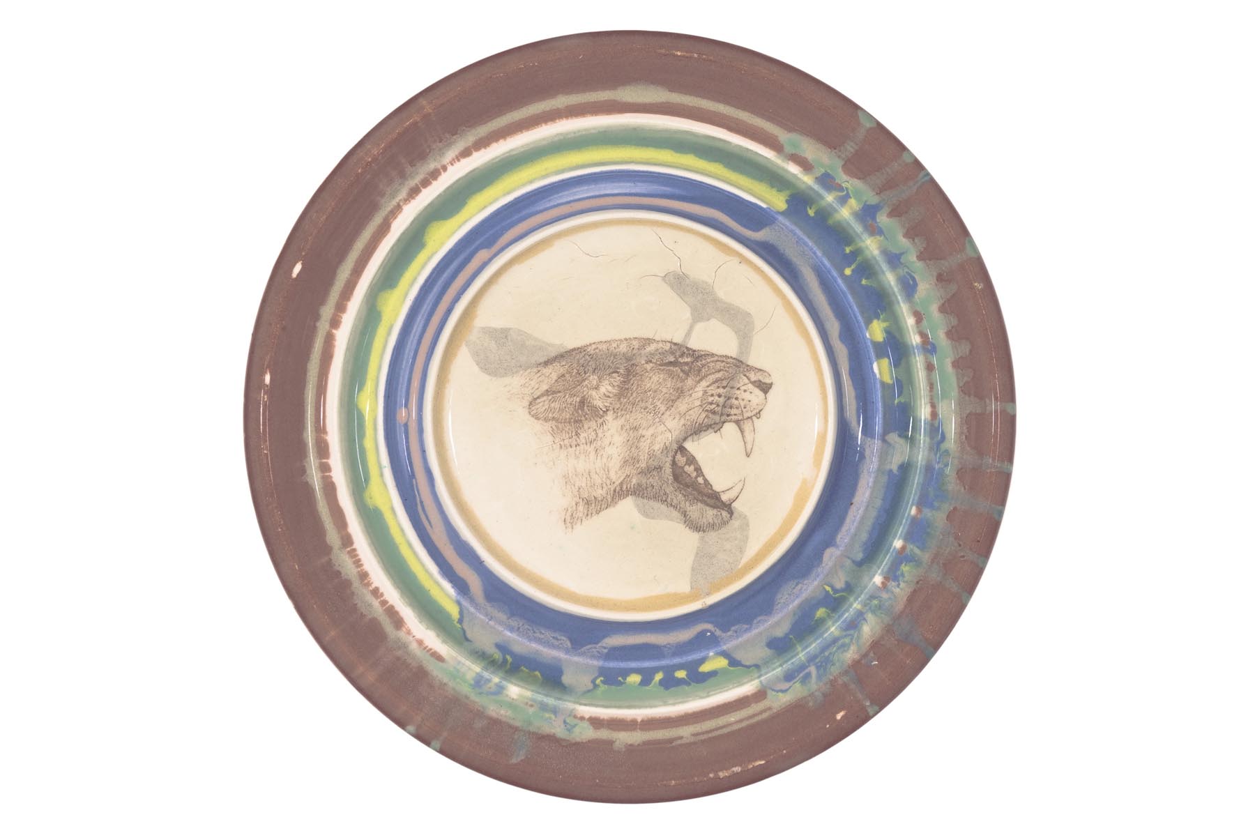      Cave lion   2002   slip decorated earthenware with photoceramic transfer   22cm diameter x 2 cm  