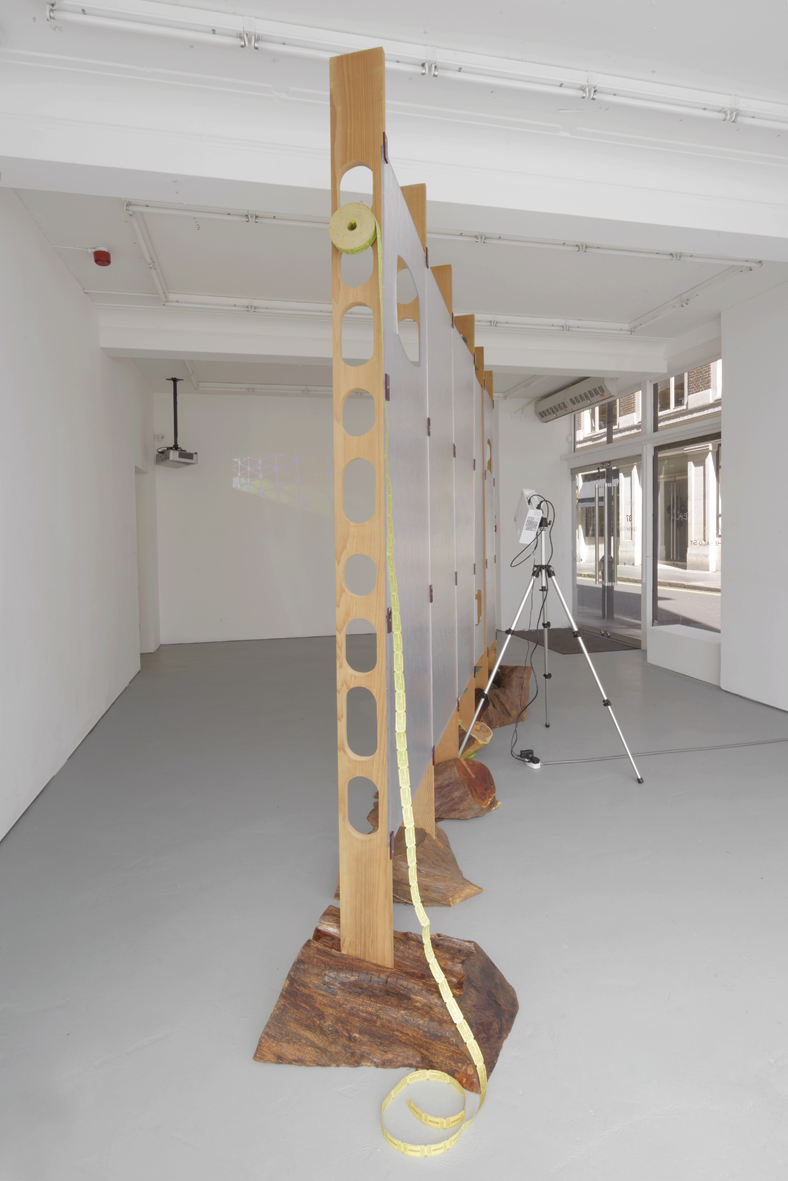     Refreshment 2005 Cedar wood, yew wood, perspex, dvd loop, silver projection screen, ticket roll, stainless steel screws, painted nails Dimensions variable, approx 261 x 360 cm l / 102.8 x 141.7 in 