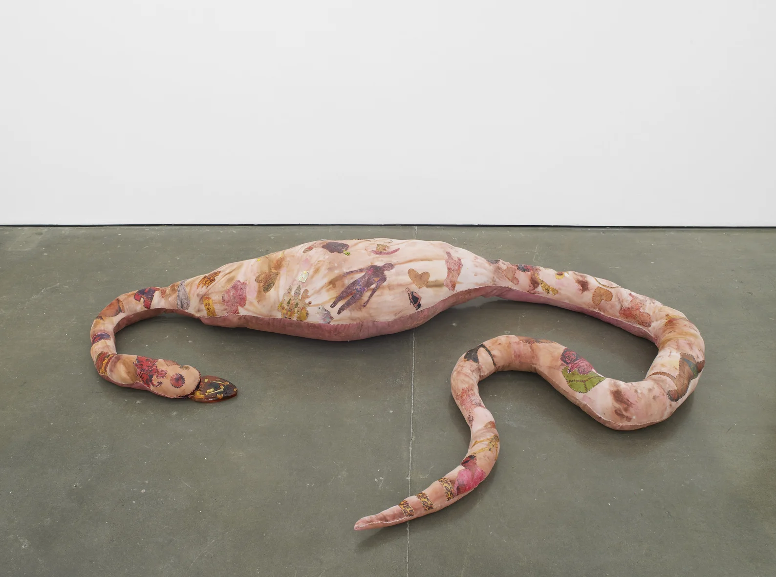 Athena Papadopoulos Shrinking Violet, Buffet Bulldozer 2015 Pepto Bismol, Crazy Colours hair dye, Malox, Gaviscon, red wine, self-tanner on fabric, fixative, image transfers, thread, enamel pins, fibrefill stuffing, manicure hand and various objects (inside), various objects in pigmented resin 42 x 200 x 160 cm / 16.5 x 78.7 x 63 in HS12-APS5438S