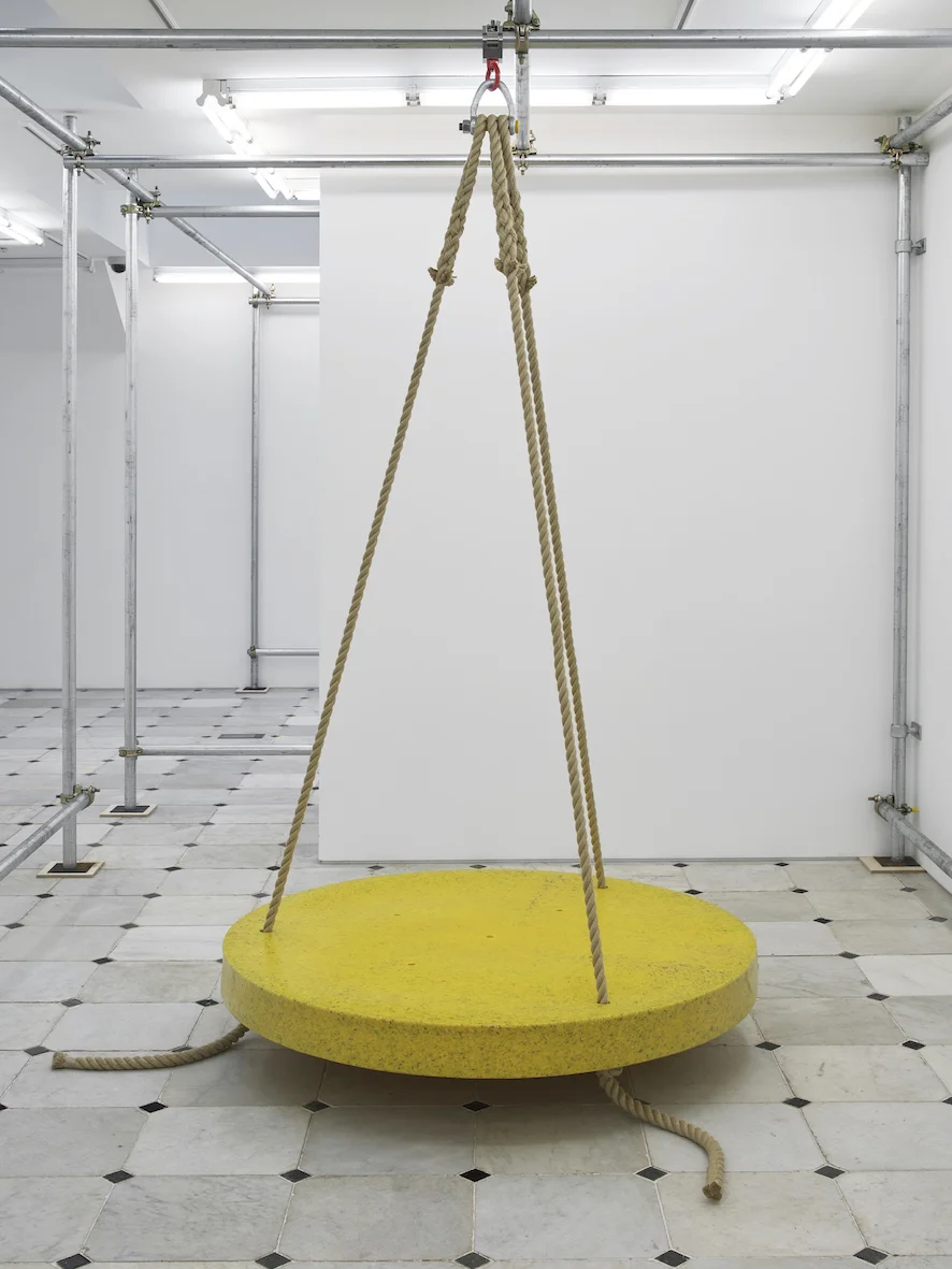 While inside (swinger) 2019 Object for animal enrichment, speckled yellow polyethylene, ropes, support shackle and carabiner ⌀134.6 cm / 53 in