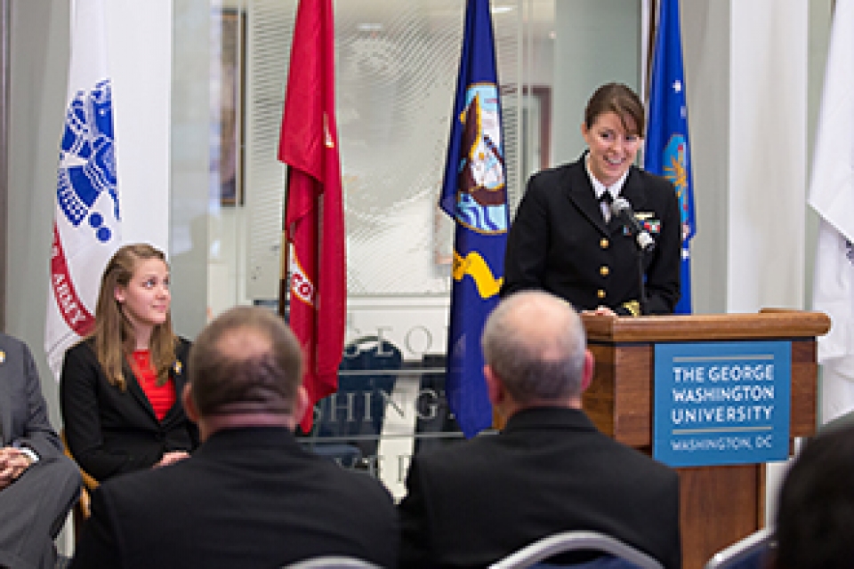 Lt. Comm. Alex Greene addresses the university community during the Veterans Day celebration at the Marvin Center on Monday.
