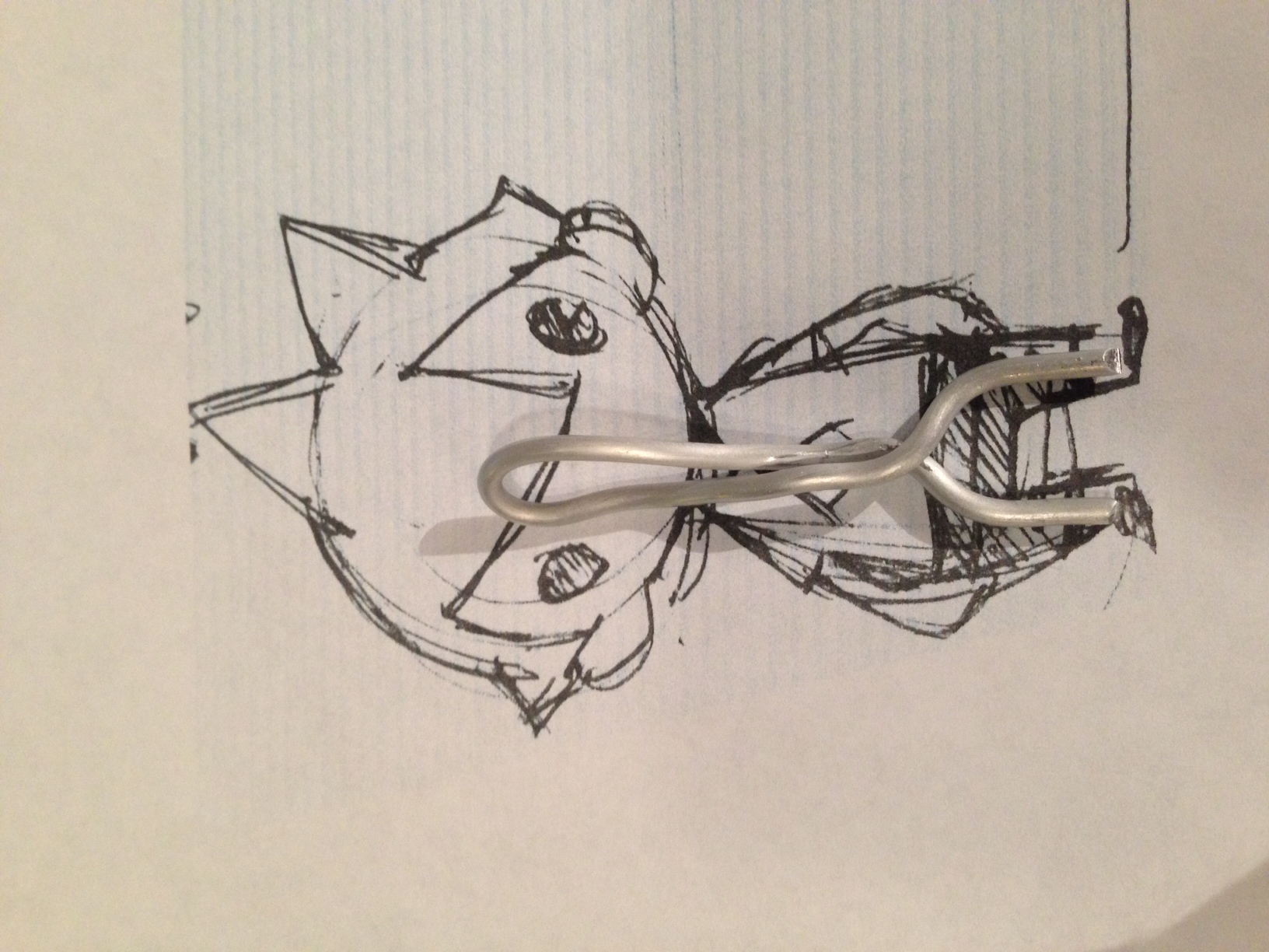 The tiny armature wire frame that I used as his skeleton.