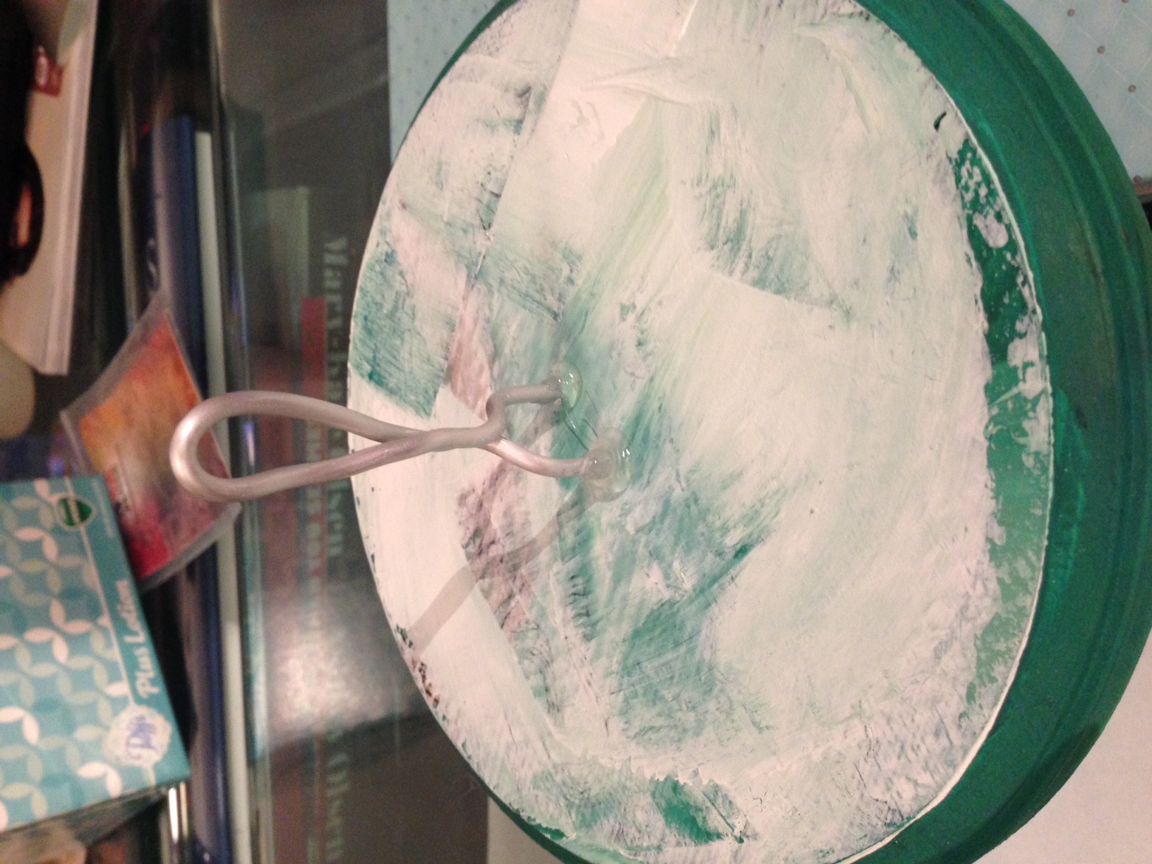 I hot glued the wire to a wooden base so that I could build up the clay slowly and easily remove it later on.