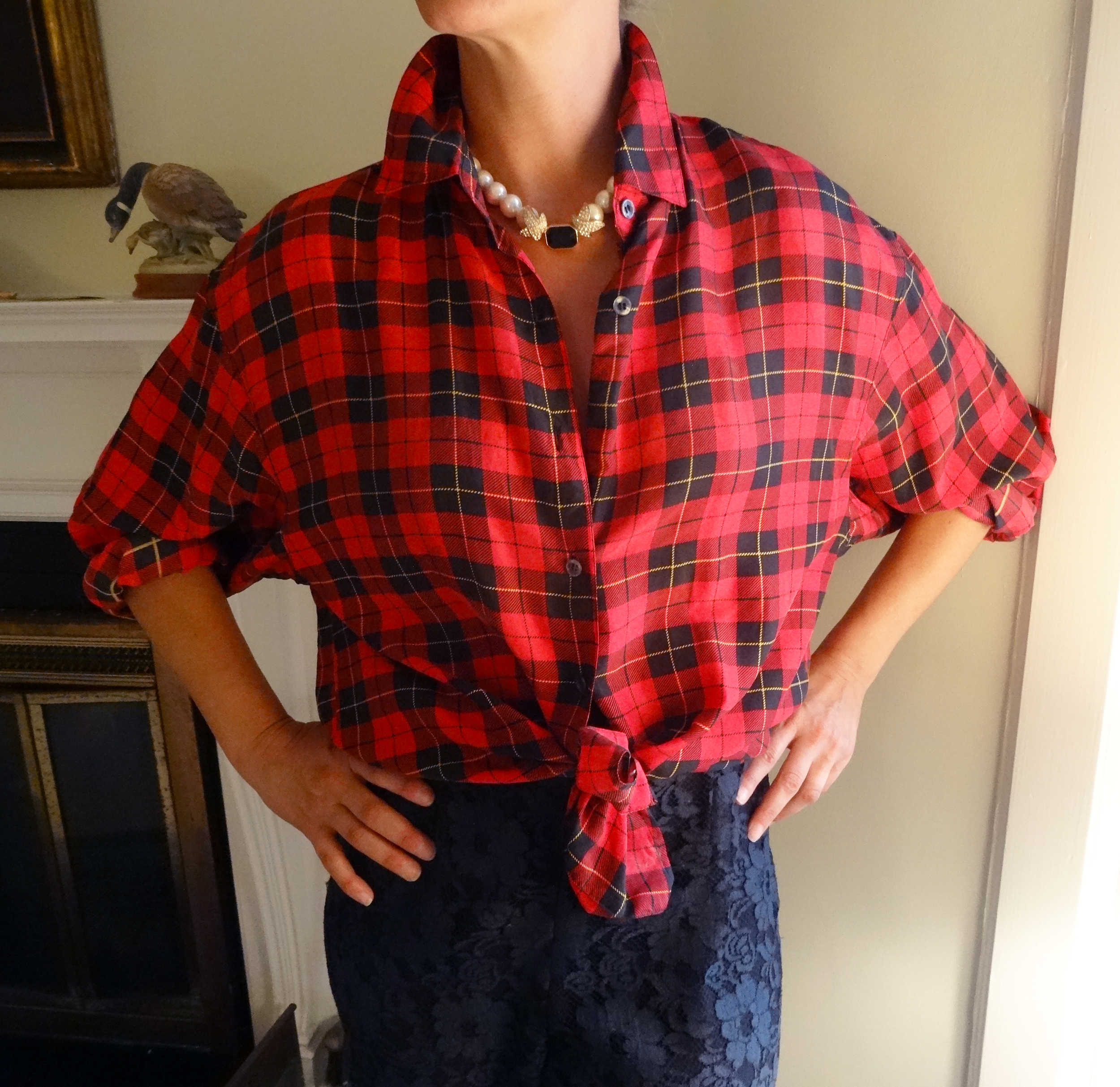 Red & black silk plaid evening blouse, with black lace pants.