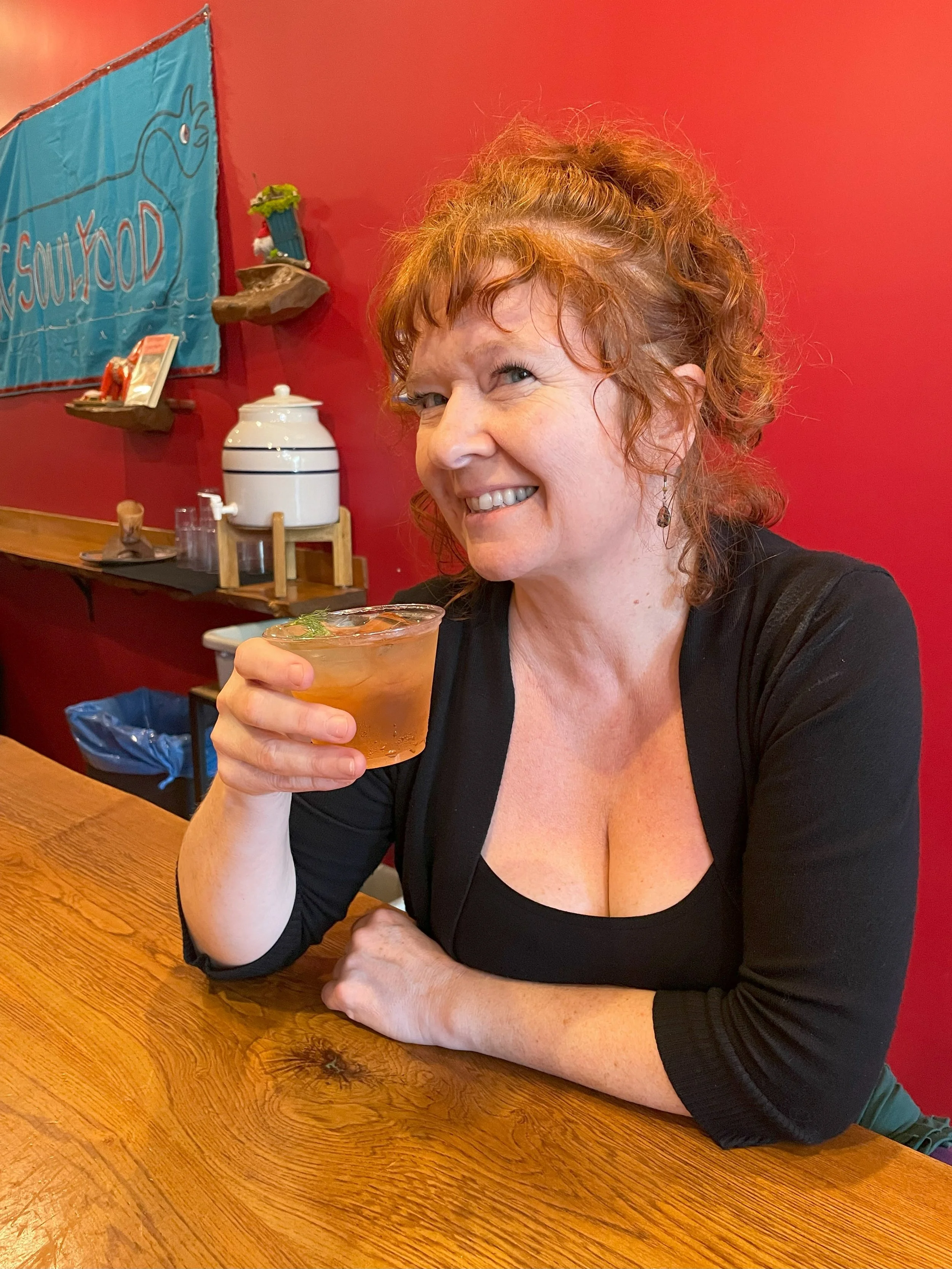 Meg with Happy Accident cocktail.jpeg