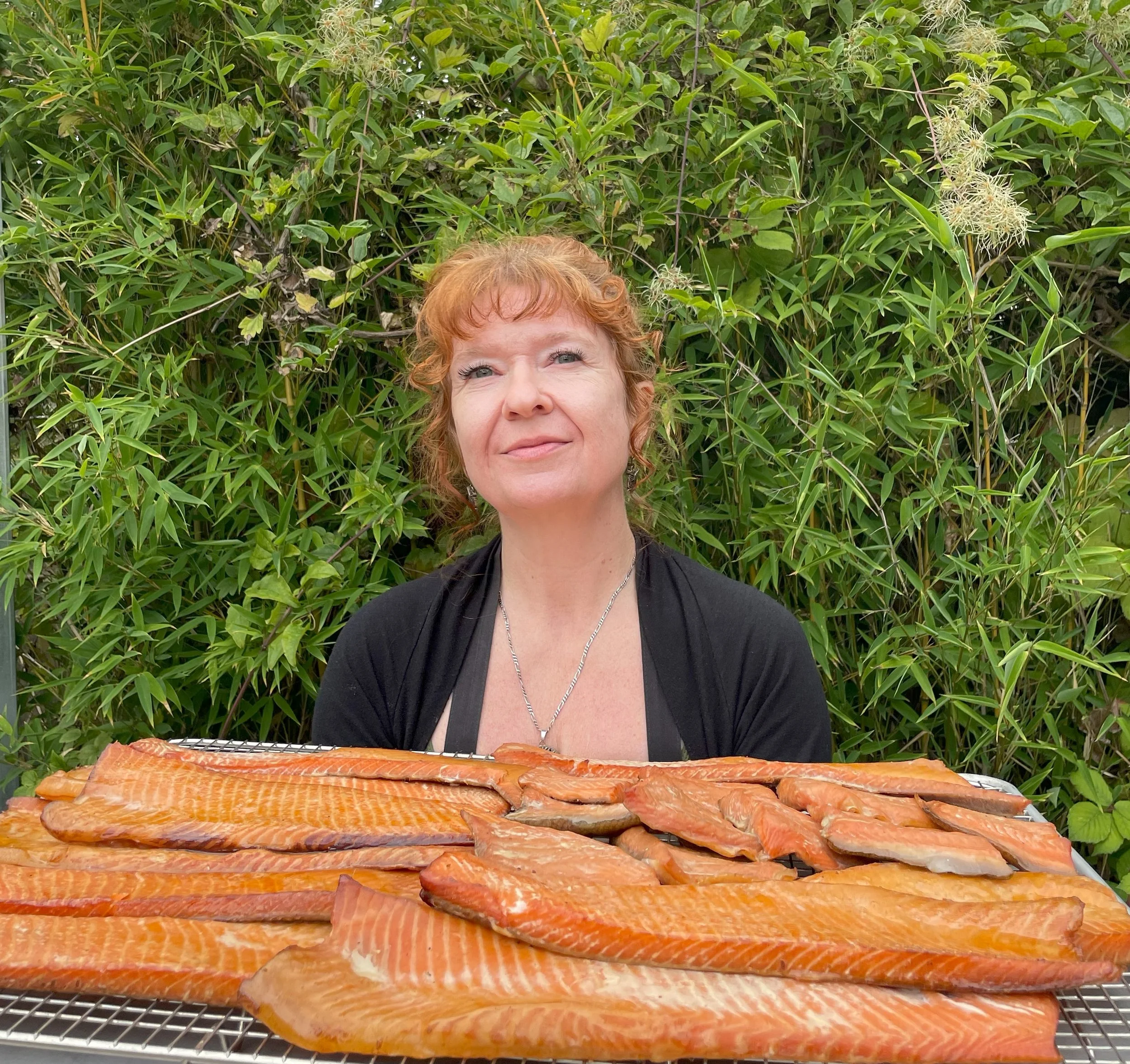 Megan holding our house-smoked salmon