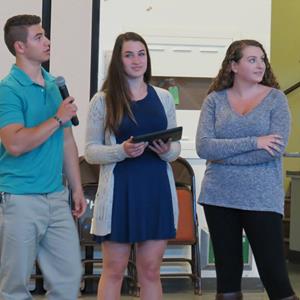Students Samantha Bowles, Molly Cubba, Daniel Navarro, and Katelin Lucine presenting on Petaluma's most prominent historical figures.