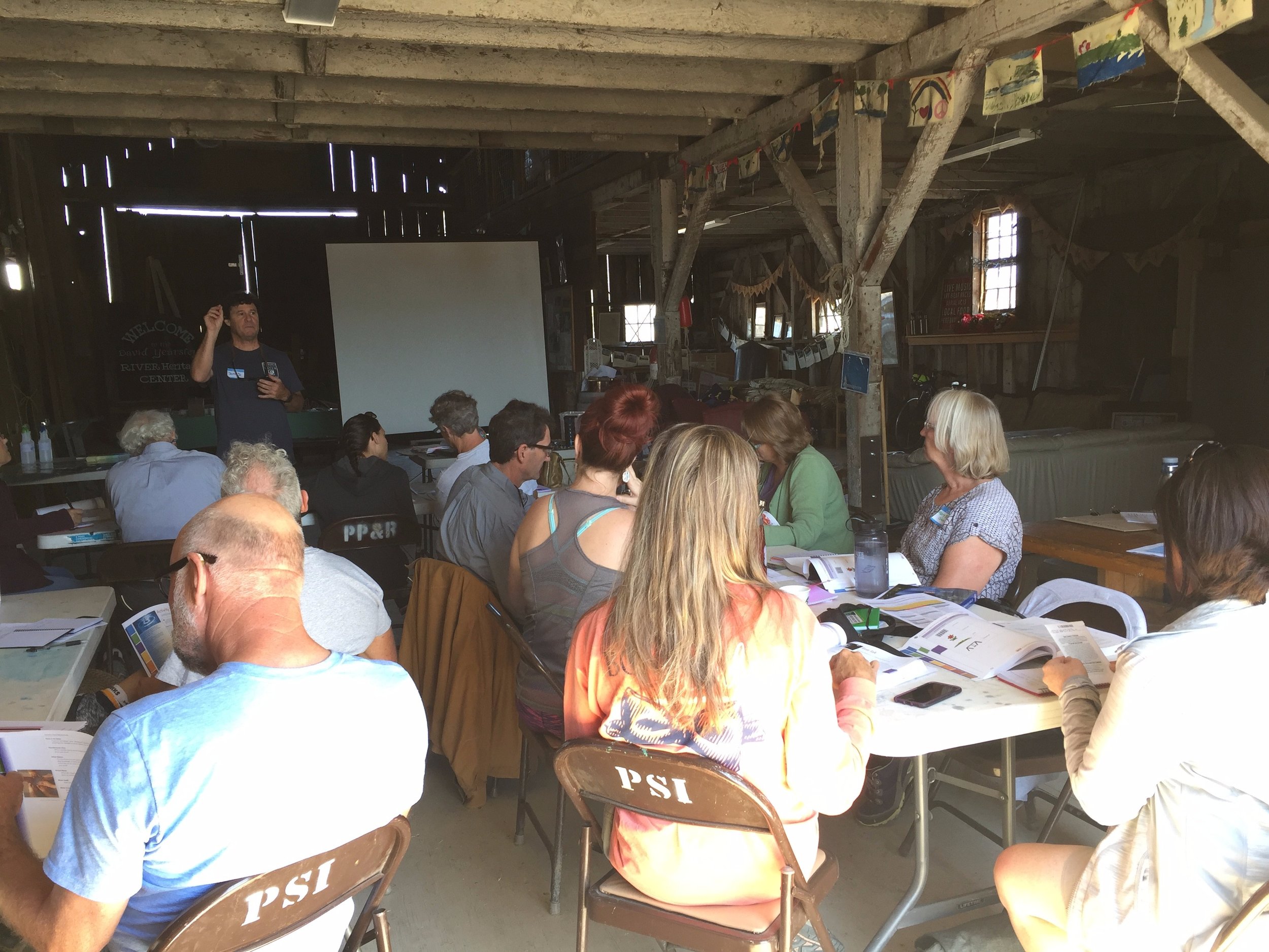 David Berman of Sonoma County Water Agency walks educators through the Project WET curriculum book.