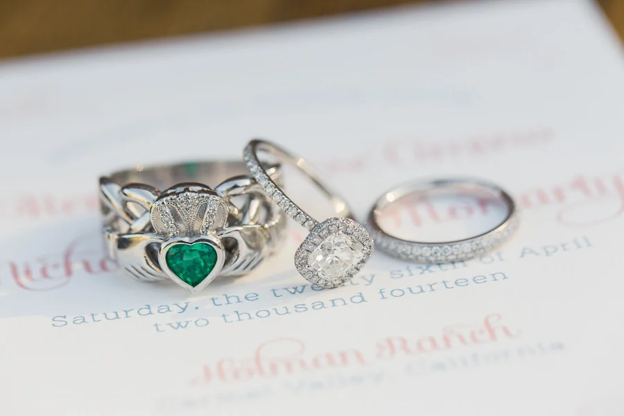 Wedding Rings and Invitation; the groom’s Claddagh Ring inspired the Save the Date design. Photo by Carlie Statsky.