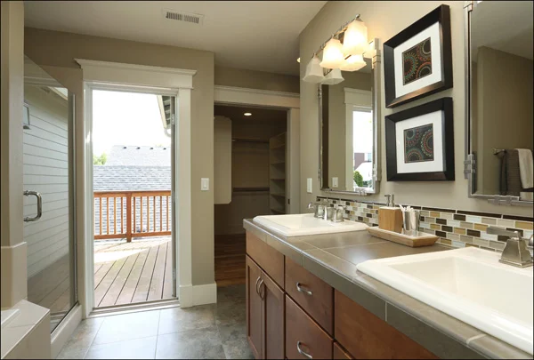Master bath and door out to deck - upper level