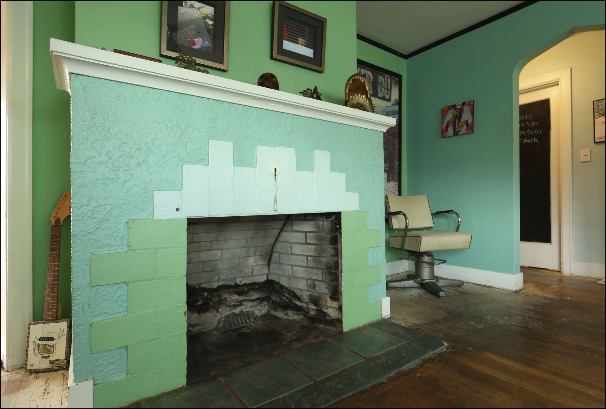  Large fireplace adds character to the living room.