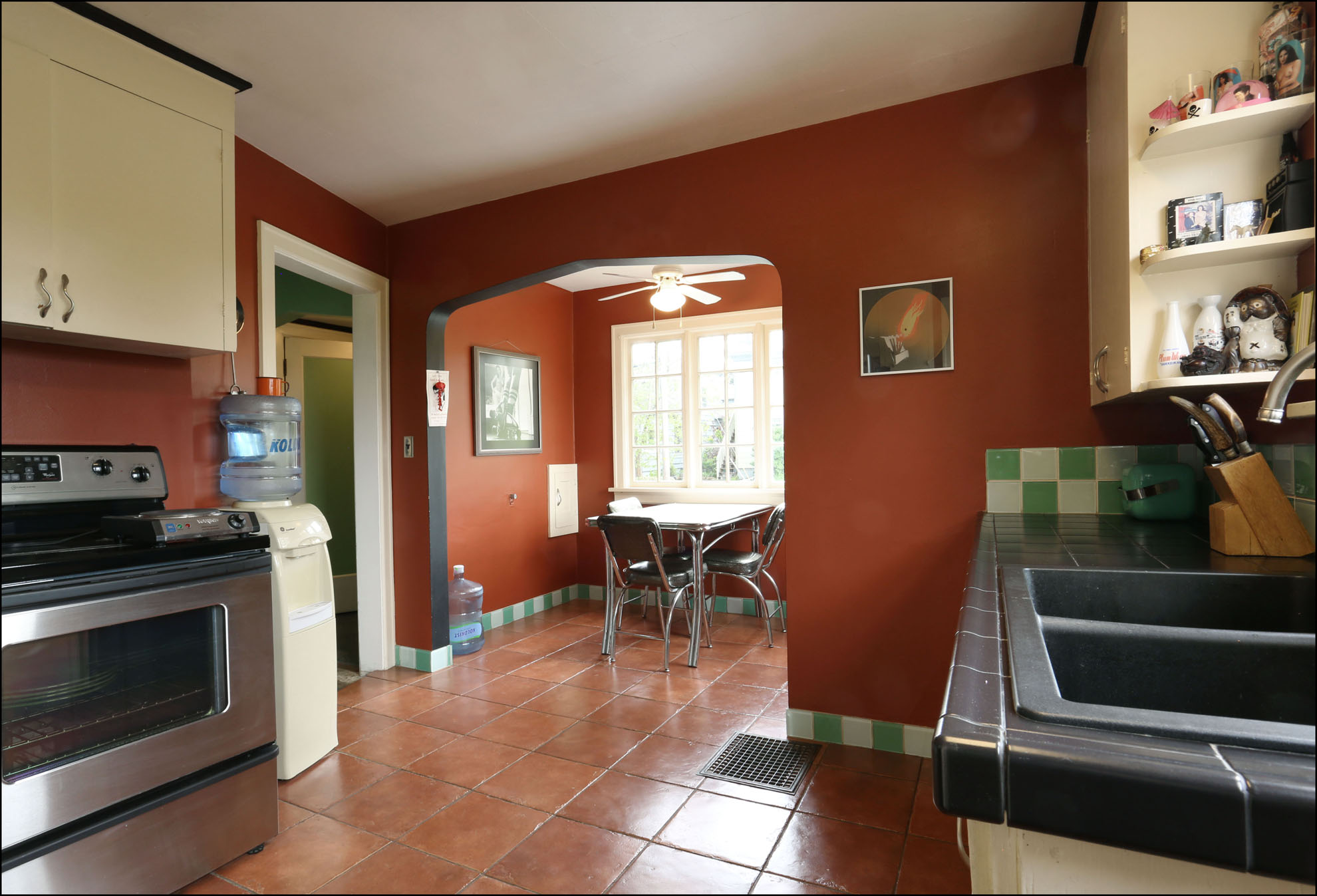  Vintage style and warm colors add to the kitchen
