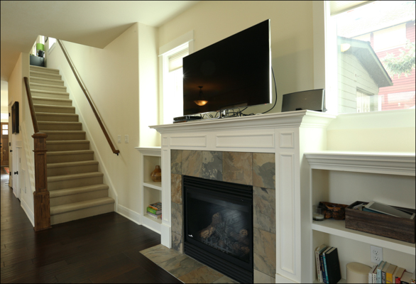 gas fireplace with built-in shelves