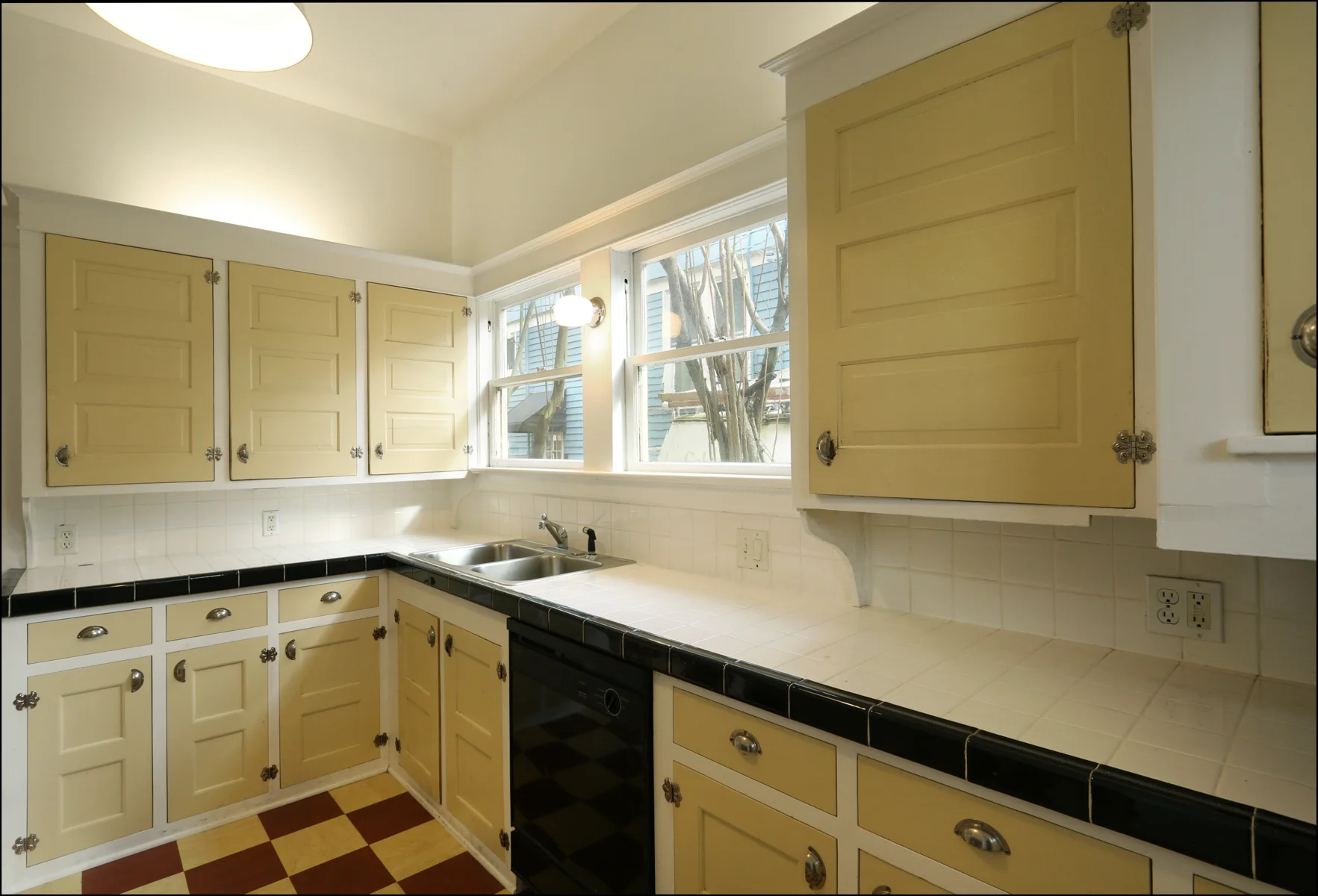 First floor kitchen with updated vintage kitchen.