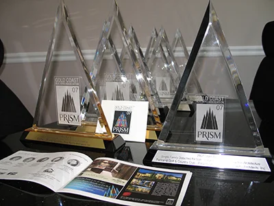 Over 25 Awards for Excellence Gold Coast Builders Association: Gold and Silver Prism Awards for Architectural design in new construction, pre-construction, renovation and commercial design. Treasure Coast Builders Association: Gold and Silver Medallion Awards in new construction and pre-construction.