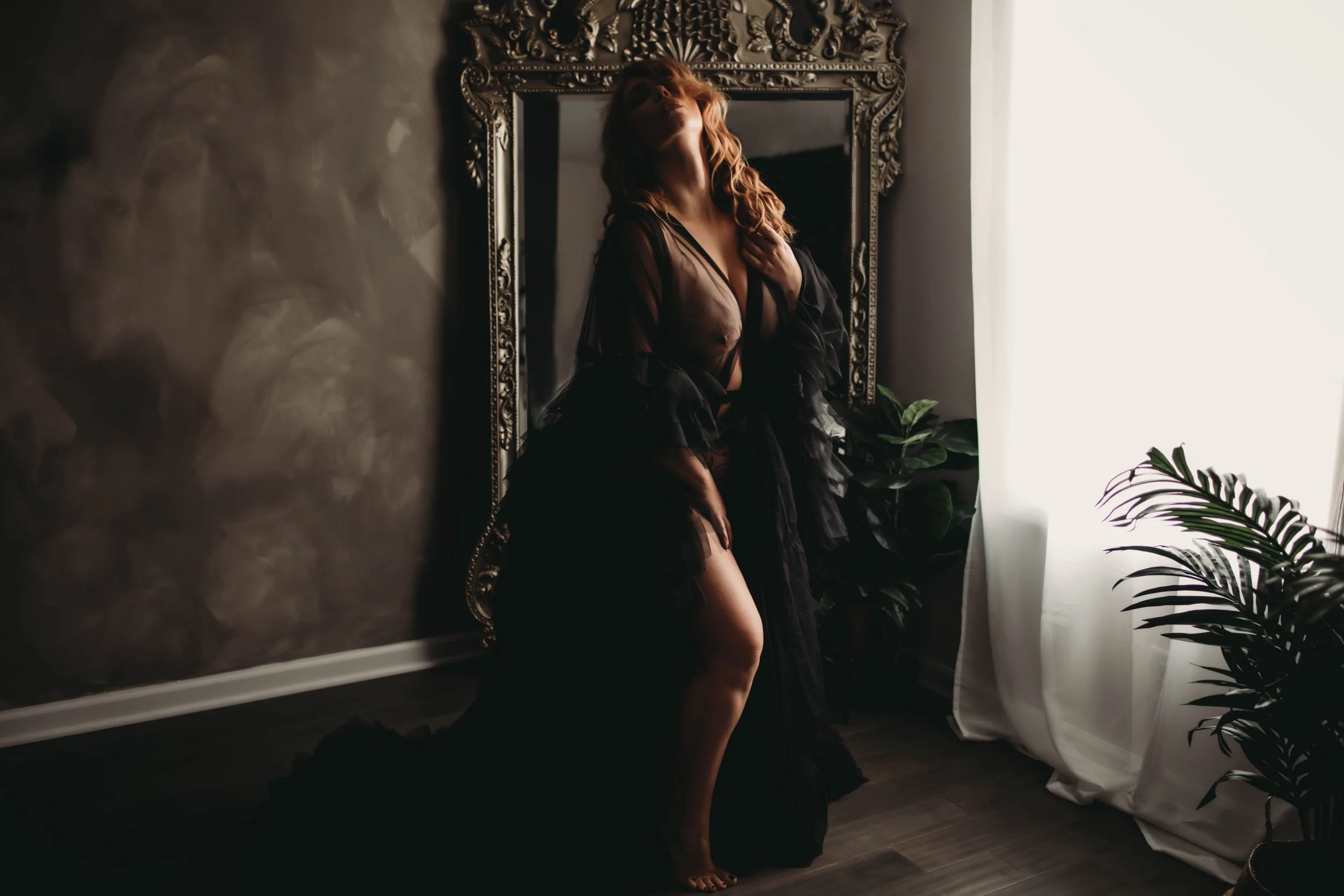 boudoir photo with a robe