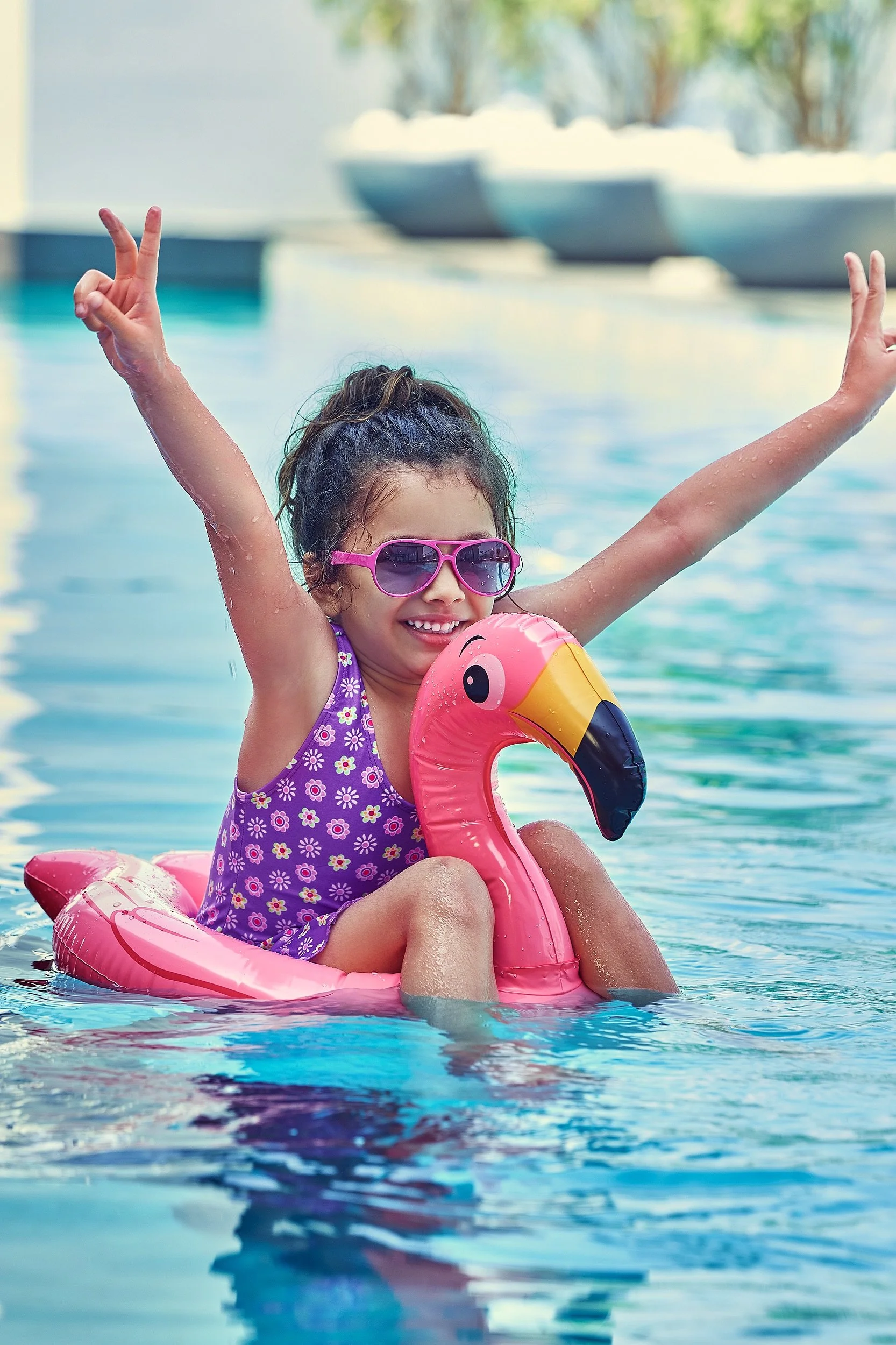 KID ON FLAMINGO FLOAT 1345.jpg