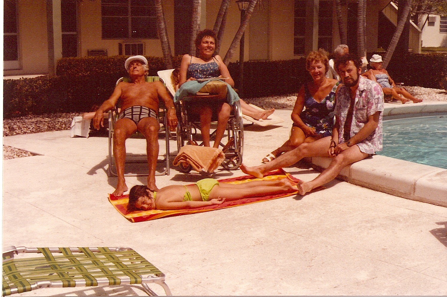 Relaxing by the pool on Marco Island, Fla., at Seabreeze West in March, 1981- our whole family.