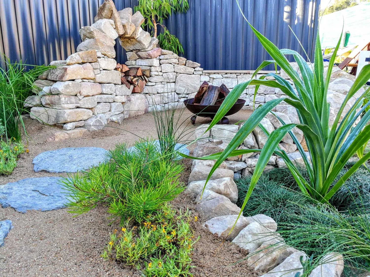 Decomposed granite throughout added to the coastal theme of the garden
