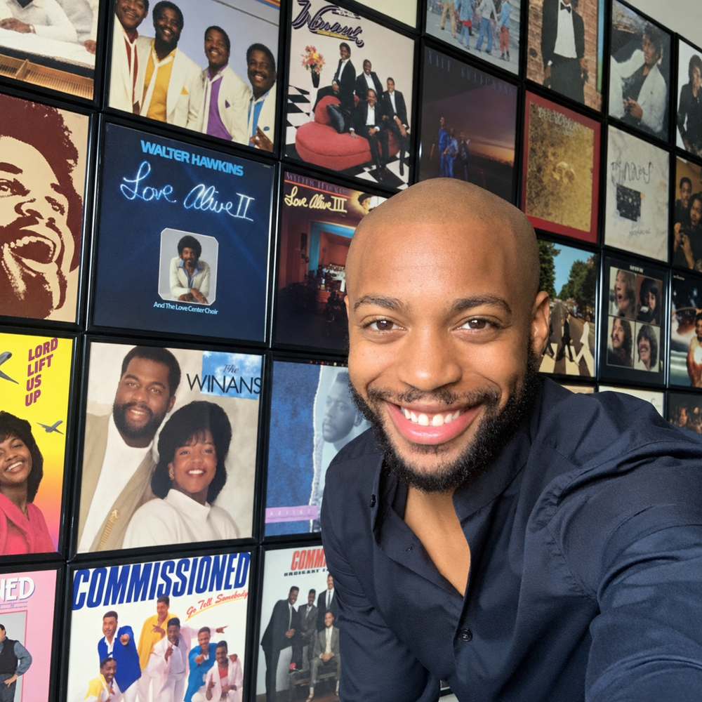 Jules Kain surrounded by historic Gospel records