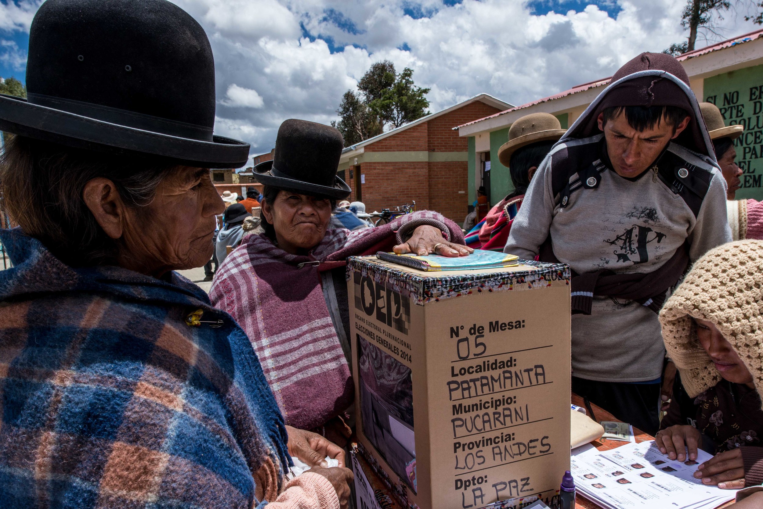 Before Morales came to power, many indigenous communities felt separated from Bolivia society. In the rural areas, such as the high Andean plateau, people walk for hours to cast their vote. Most of them support Evo Morales.