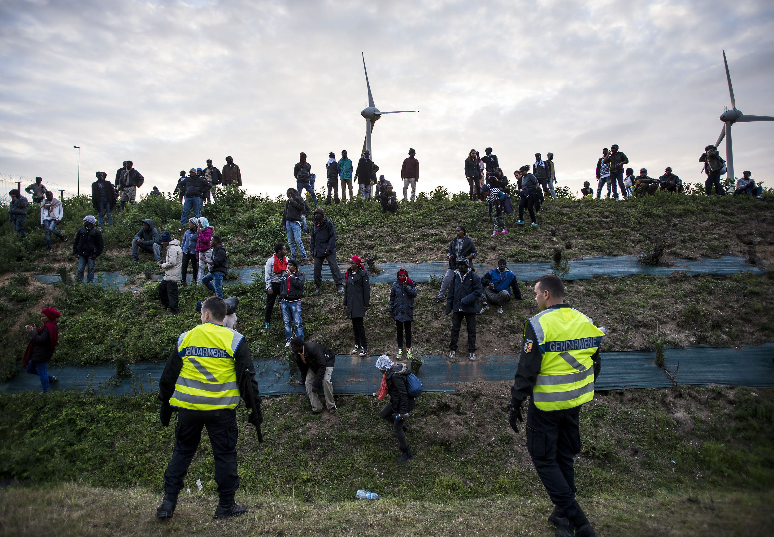 Migrants attempt to cross the border at Calais