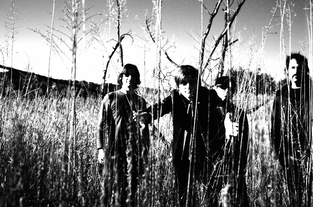 Truckee Brothers dutiful field shot promo pic for the 'Double Happiness' album (2007). Photo Frank Lee Drennen