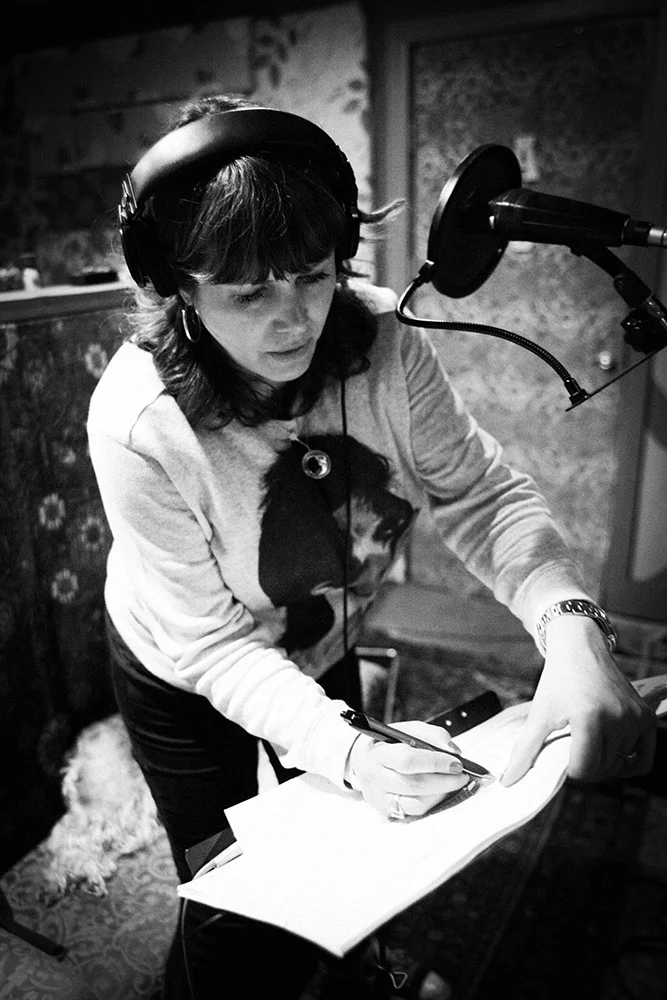 Cindy Wasserman singing 'Love Is A Bomb' during the 'Fürst In The Dirt' sessions, notating the usual last minute lyric changes. (2014). Photo Stacie Huckeba.